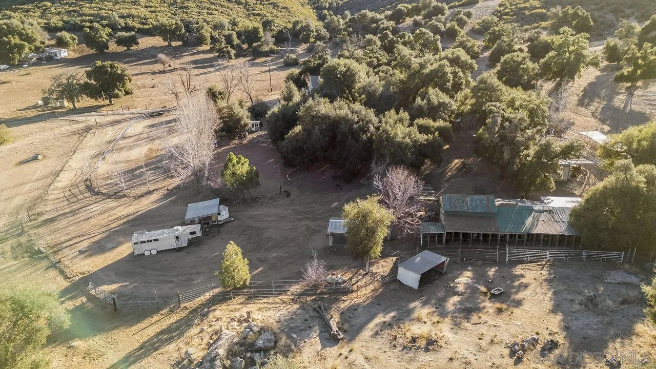 9018 Vernal Lane Descanso, CA 91916 - Photo 51 of 56 a backyard of a house with table and chairs