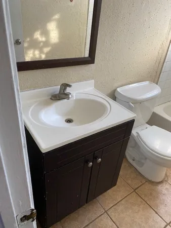 a bathroom with a sink and a toilet