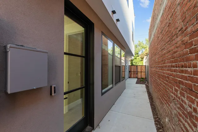 a view of gallery with wooden floor