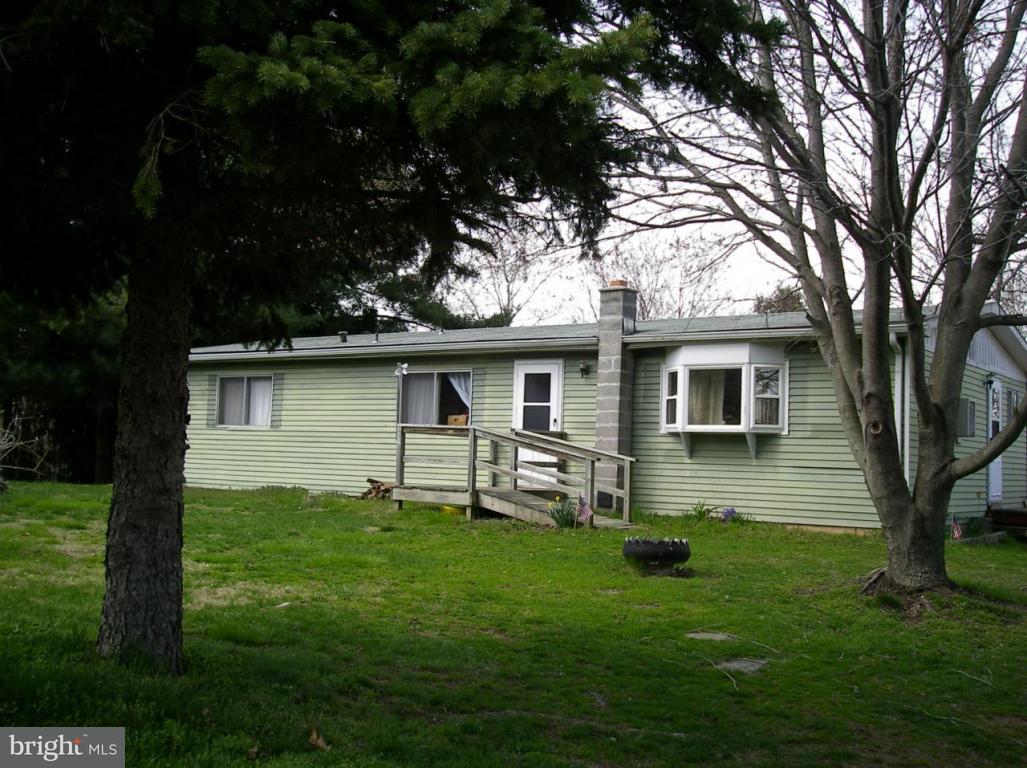 492 Kirks Mill Road Nottingham, PA 19362 - Photo 2 of 5 a front view of house with yard and green space