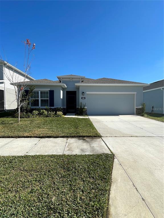 a front view of house with yard