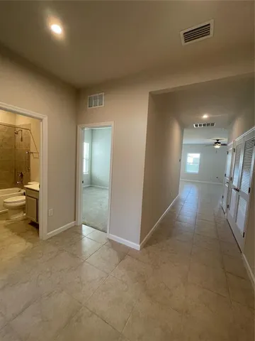 a view of an empty room and window