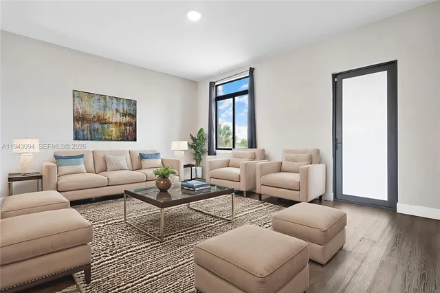 a bedroom with a bed and a table