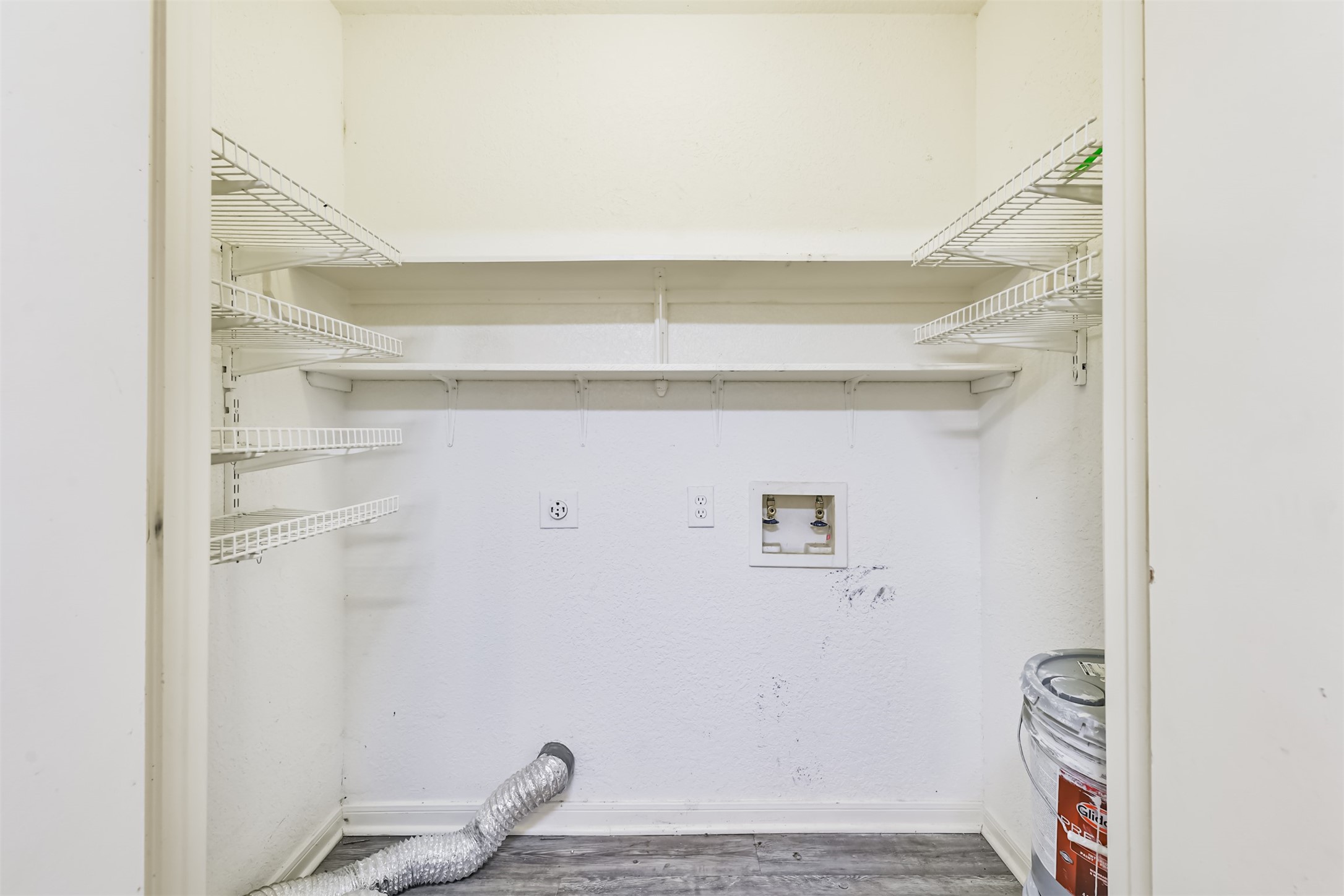 617 Avenue I Conroe, TX 77301 - Photo 11 of 19 Laundry room off kitchen with electric dryer connection