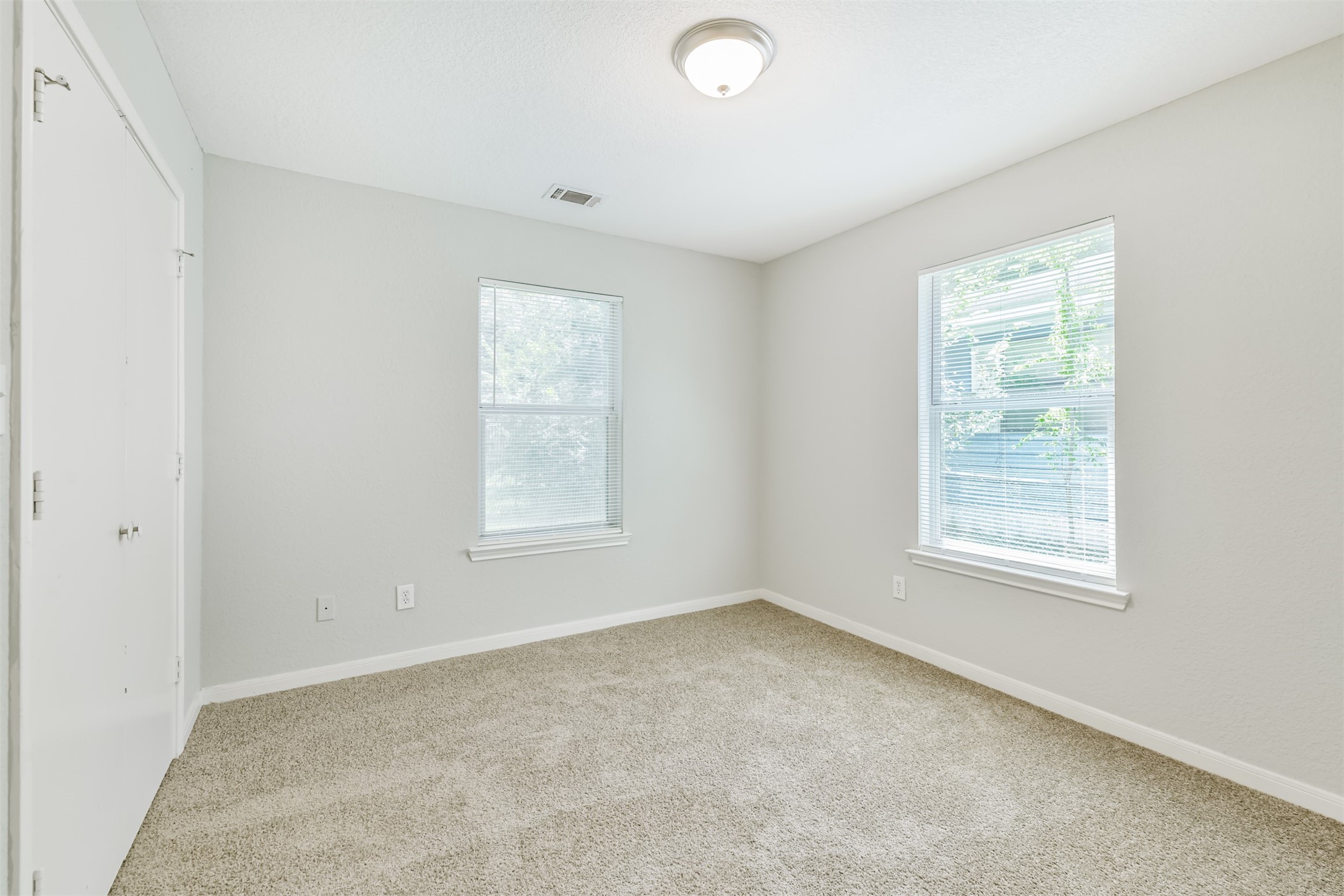 617 Avenue I Conroe, TX 77301 - Photo 13 of 19 All bedrooms have new carpet