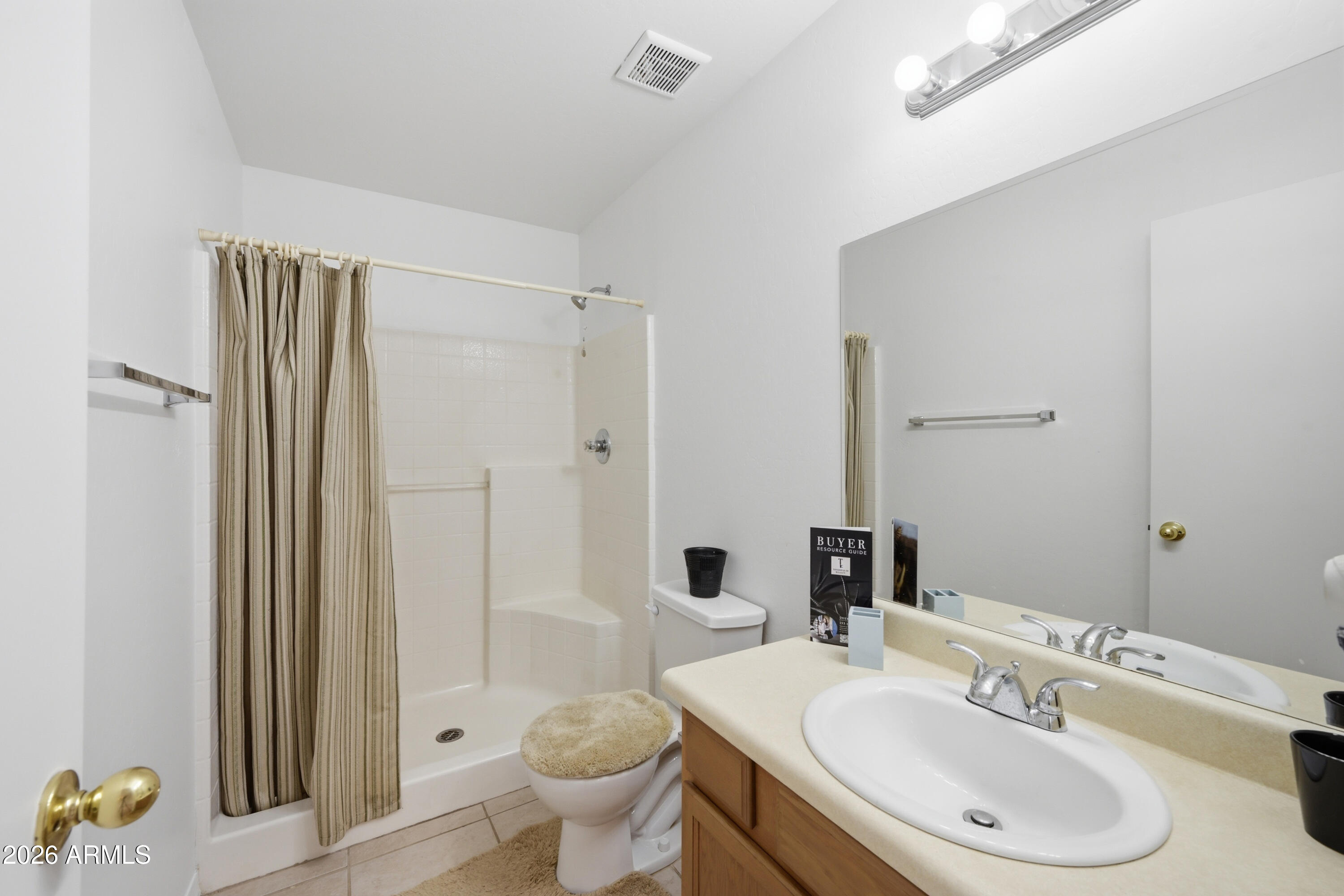 3527 East Batten Road Eloy, AZ 85131 - Photo 8 of 17 a bathroom with a sink toilet and shower