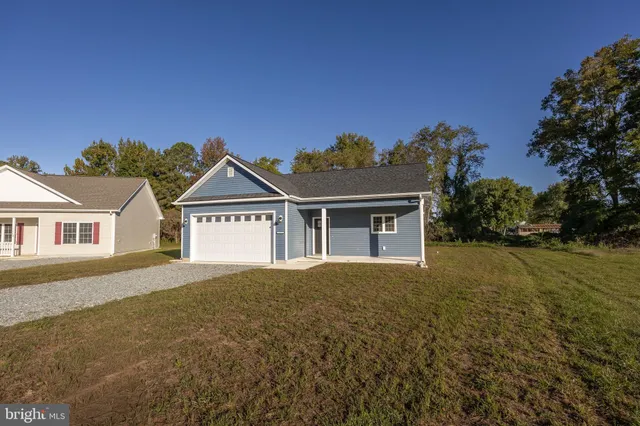 front view of house with a yard