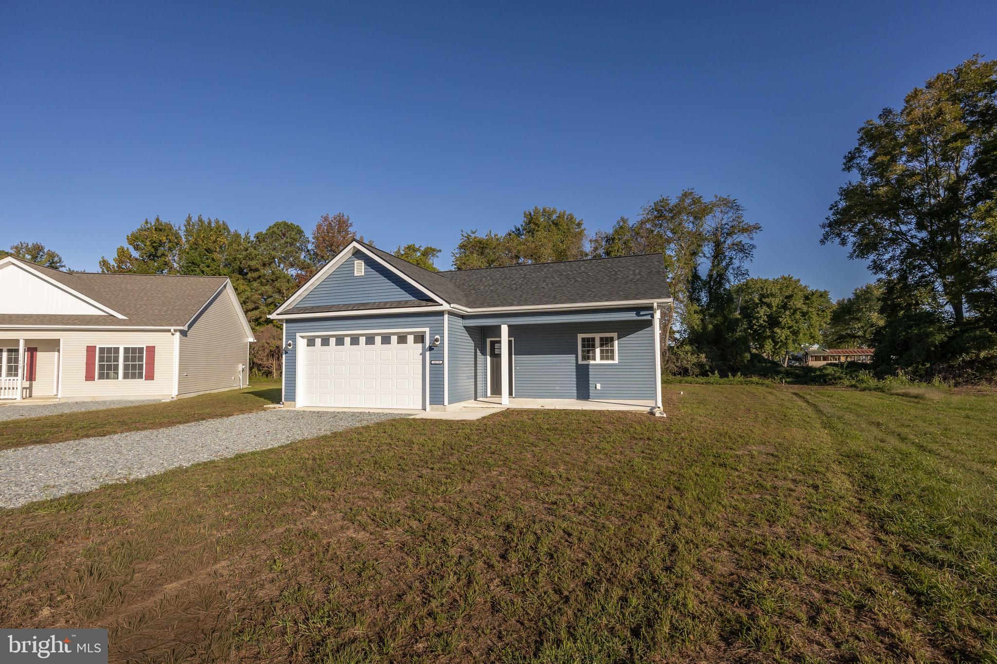 11775 St Stephens Way Princess Anne, MD 21853 - Photo 2 of 51 front view of house with a yard