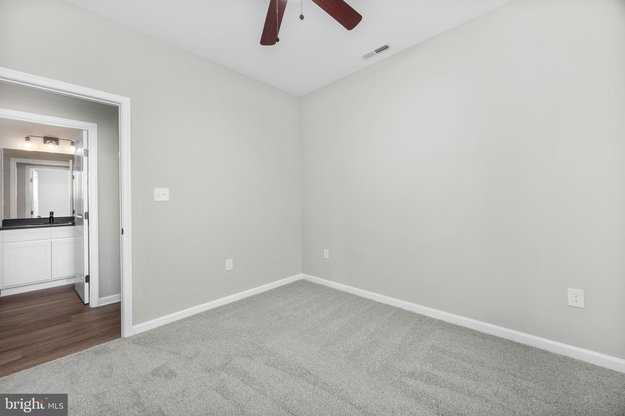 11775 St Stephens Way Princess Anne, MD 21853 - Photo 21 of 51 wooden floor in an empty room