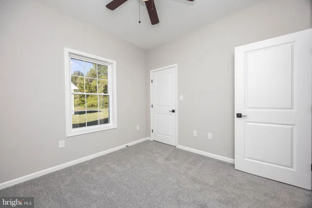 a bathroom with a sink a toilet and a bathtub