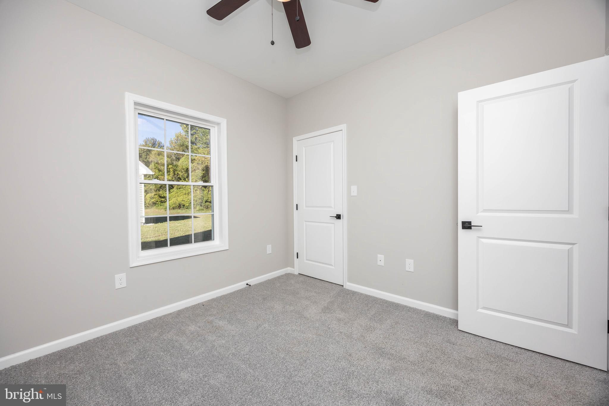 11775 St Stephens Way Princess Anne, MD 21853 - Photo 23 of 51 an empty room with windows and closet