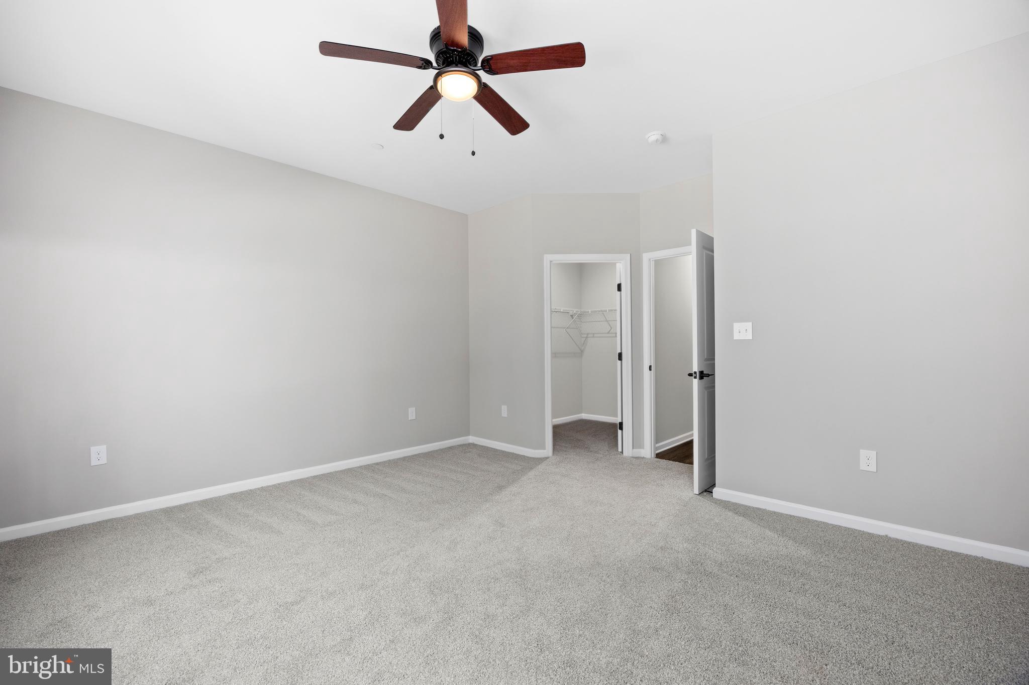 11775 St Stephens Way Princess Anne, MD 21853 - Photo 33 of 51 an empty room with closet and fan