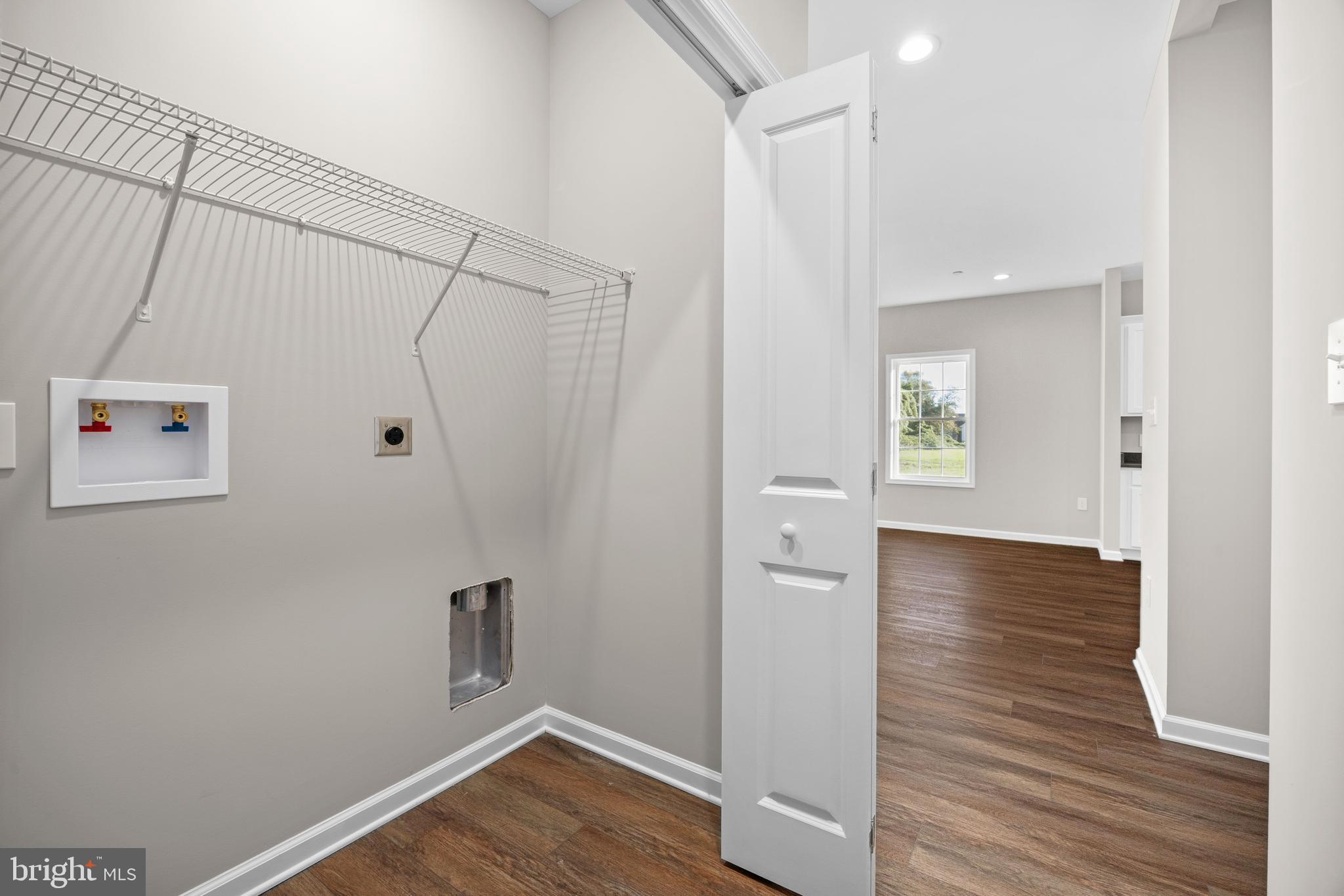 11775 St Stephens Way Princess Anne, MD 21853 - Photo 40 of 51 a view of a hallway with wooden floor