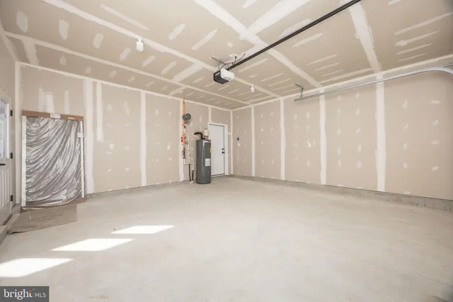 a view of swimming pool with large windows and trees