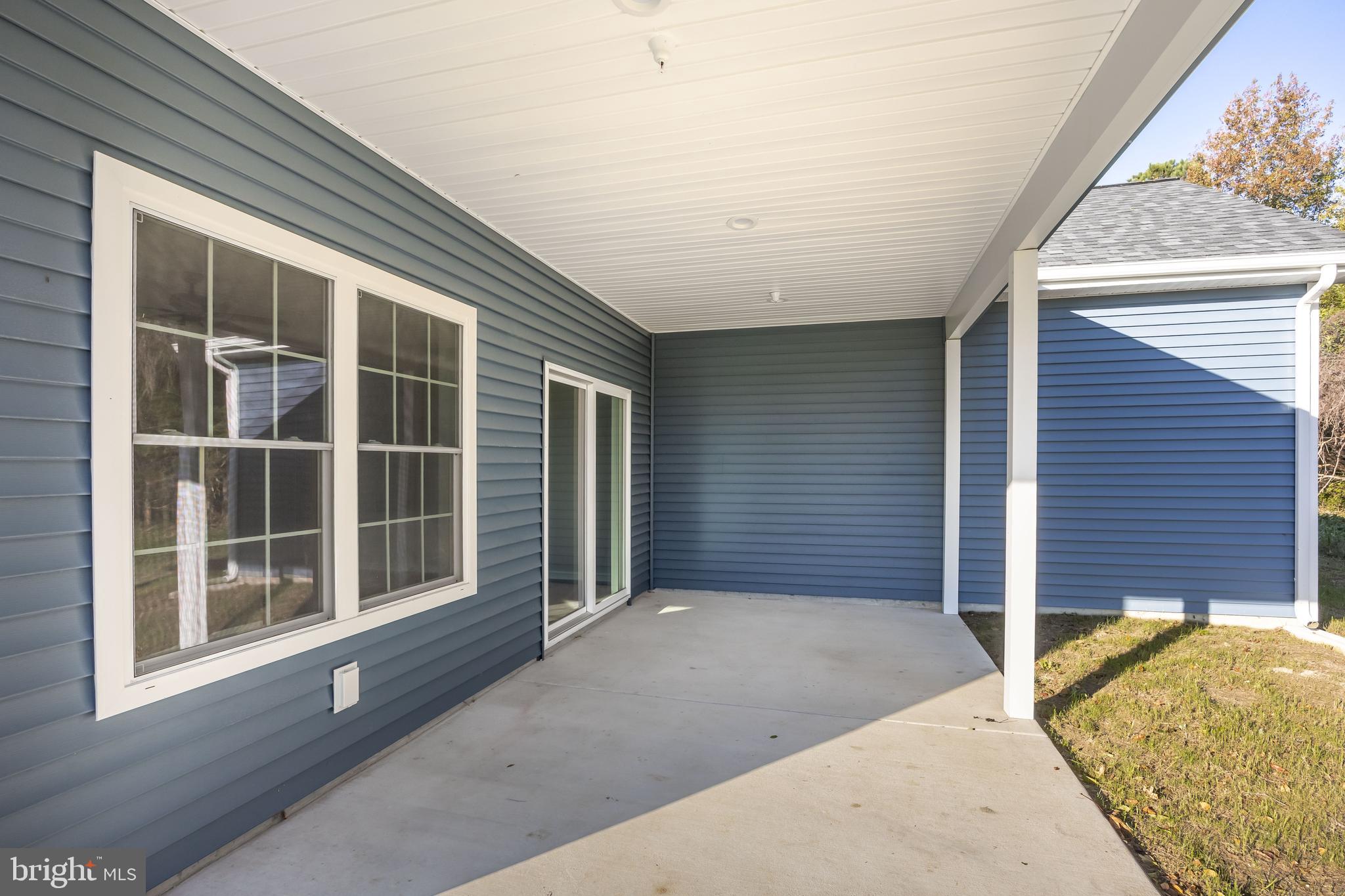 11775 St Stephens Way Princess Anne, MD 21853 - Photo 45 of 51 a view of backyard with large windows