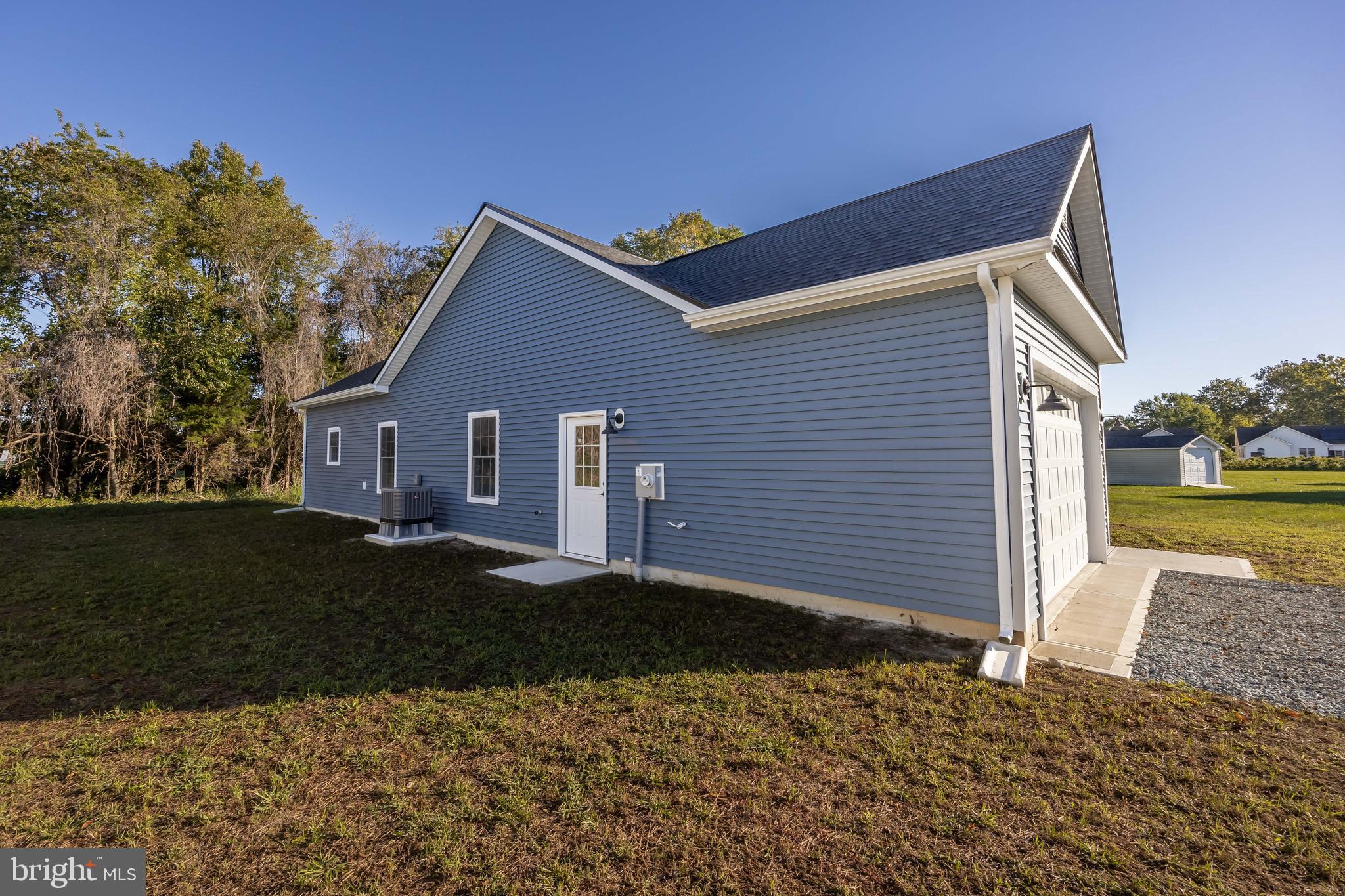 11775 St Stephens Way Princess Anne, MD 21853 - Photo 46 of 51 a front view of a house with a yard