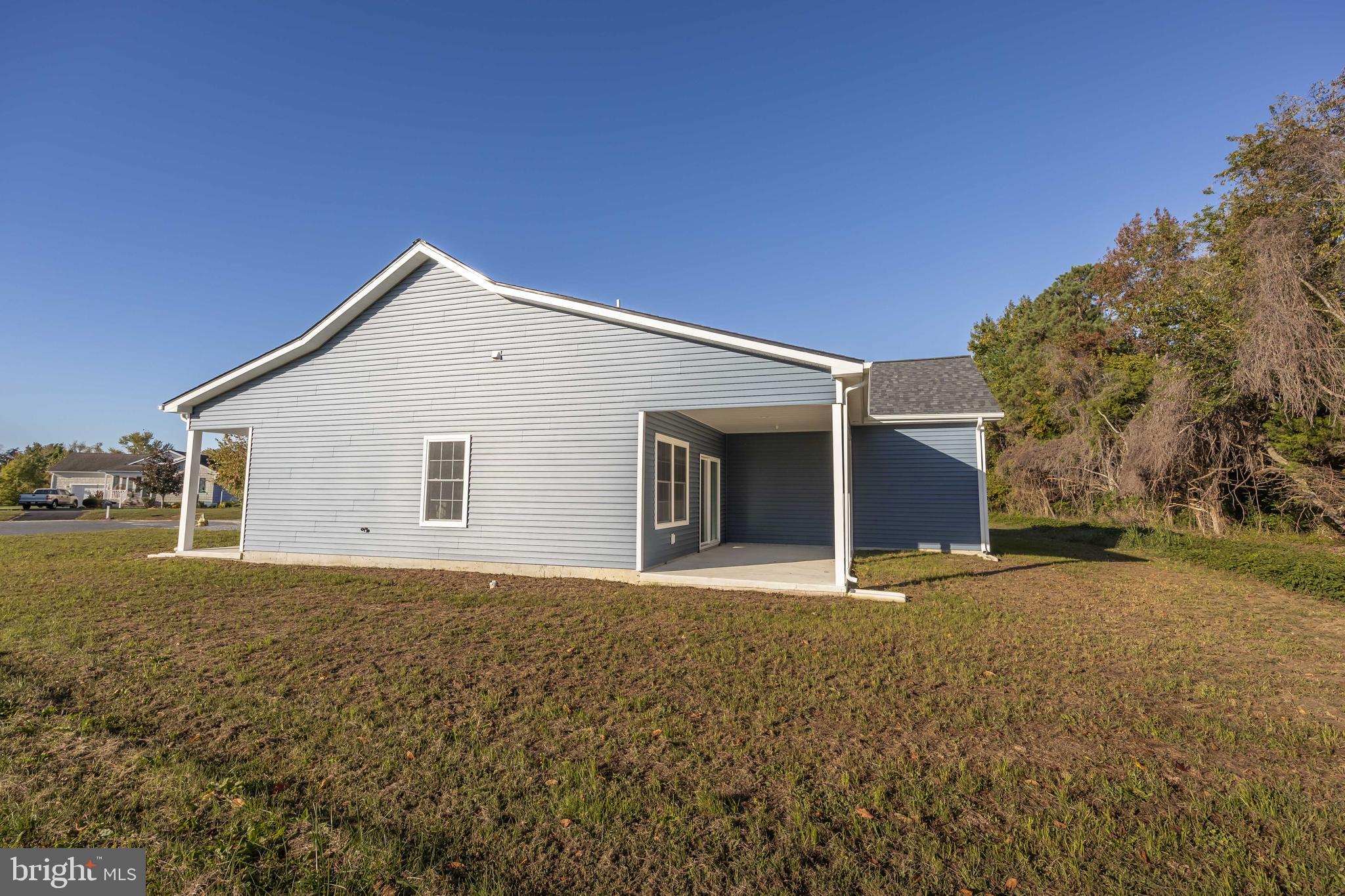 11775 St Stephens Way Princess Anne, MD 21853 - Photo 48 of 51 a view of a house with a yard