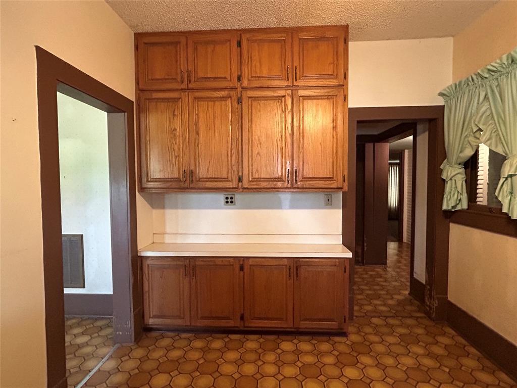 341 West Fm 574 Goldthwaite, TX 76844 - Photo 26 of 40 a view of a refrigerator a sink and cabinets