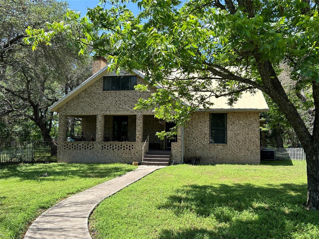 341 West Fm 574 Goldthwaite, TX 76844 - Photo 3 of 40 a front view of a house with a yard