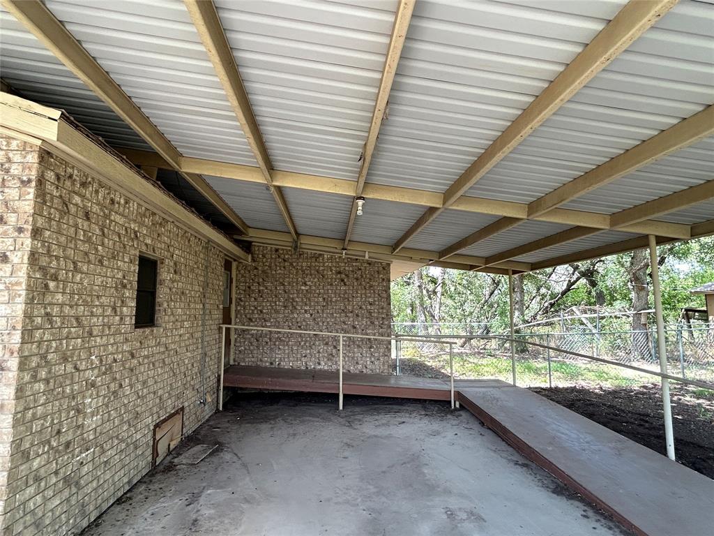 341 West Fm 574 Goldthwaite, TX 76844 - Photo 36 of 40 a view of a room with wooden walls and roof