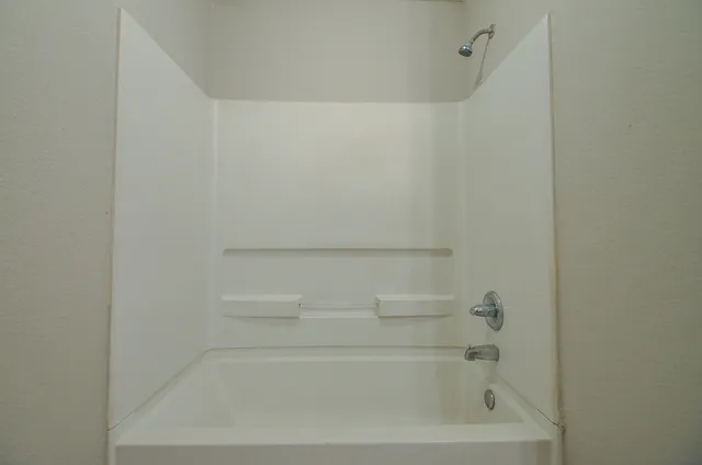 a close up of a bathtub