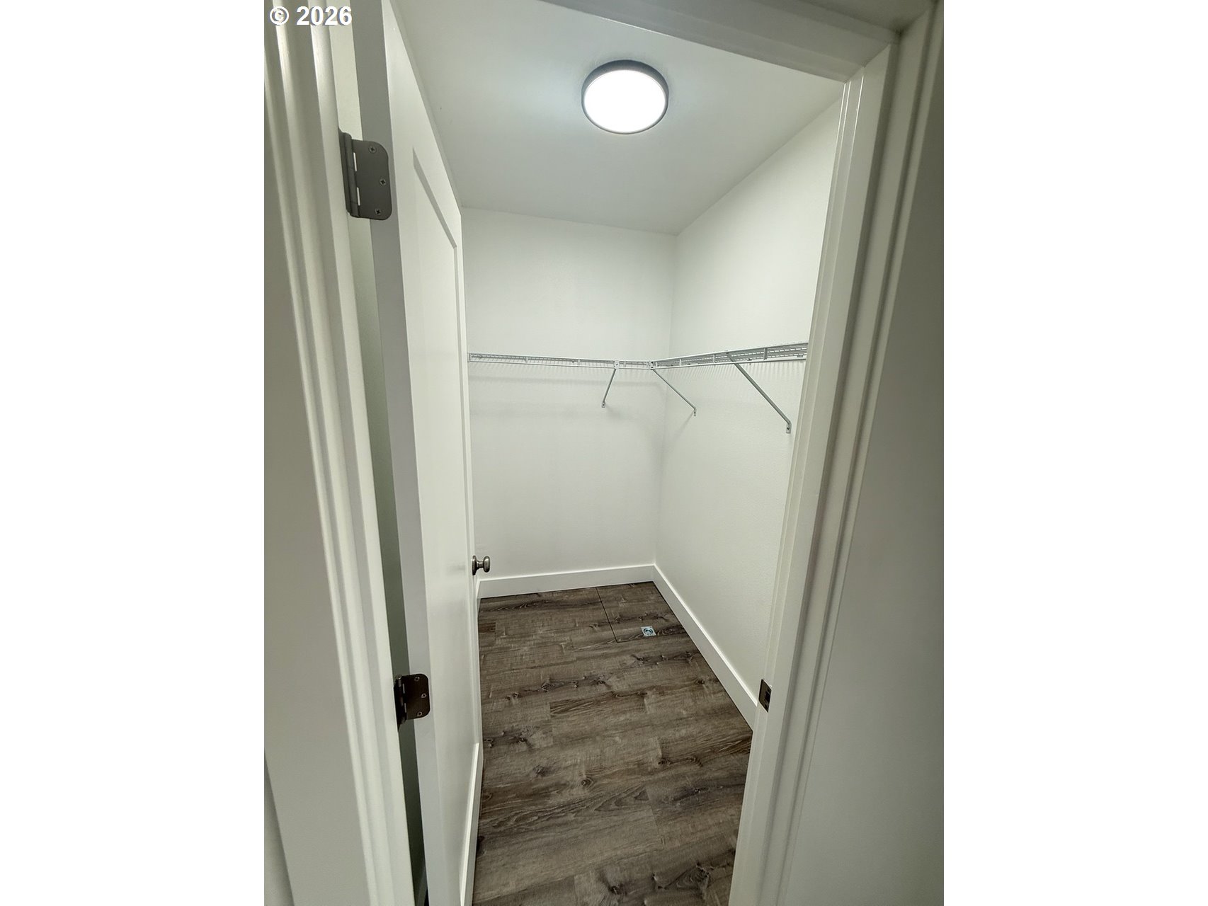 905 Monroe Street Harrisburg, OR 97446 - Photo 19 of 31 a view of a hallway with wooden floor