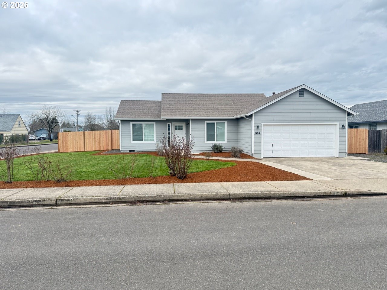 905 Monroe Street Harrisburg, OR 97446 - Photo 2 of 31 a house with a outdoor space