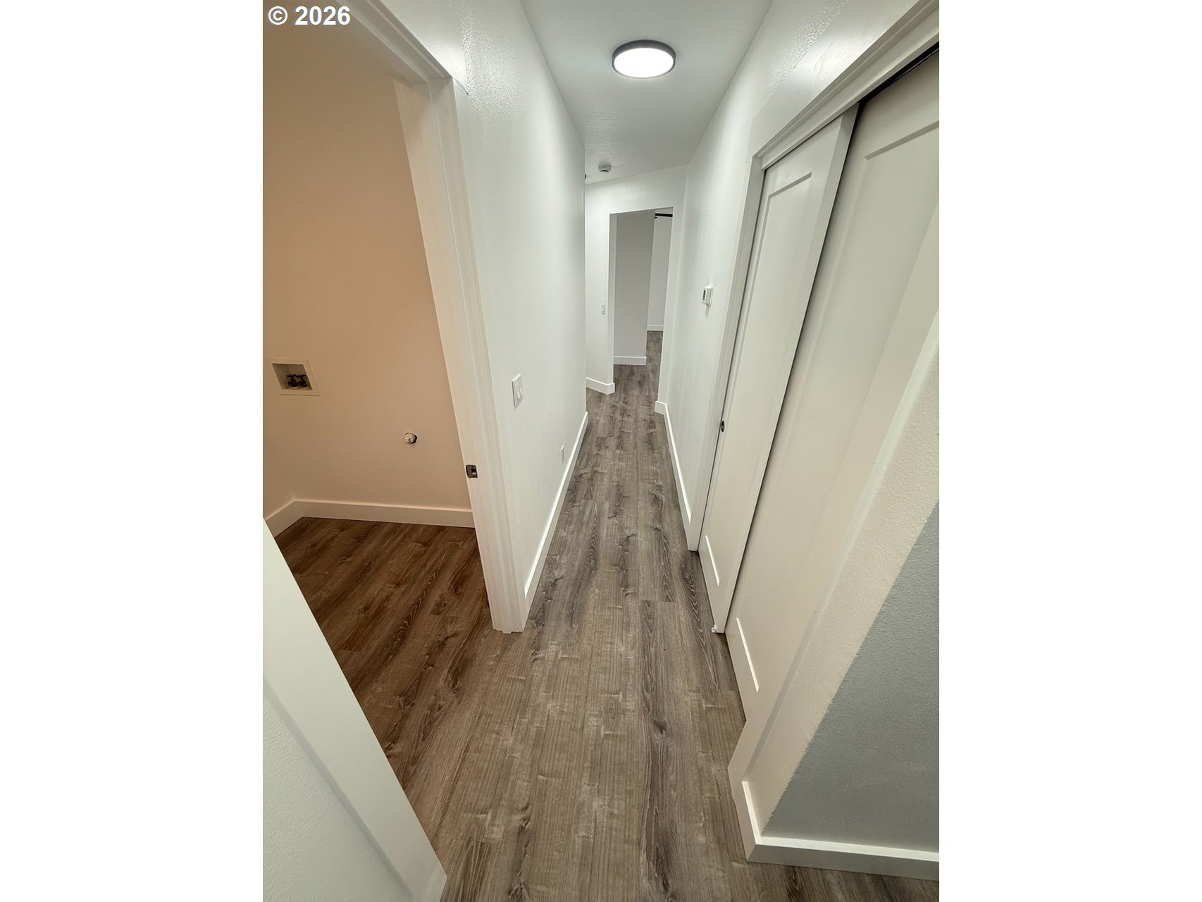 905 Monroe Street Harrisburg, OR 97446 - Photo 28 of 31 a view of a hallway with staircase