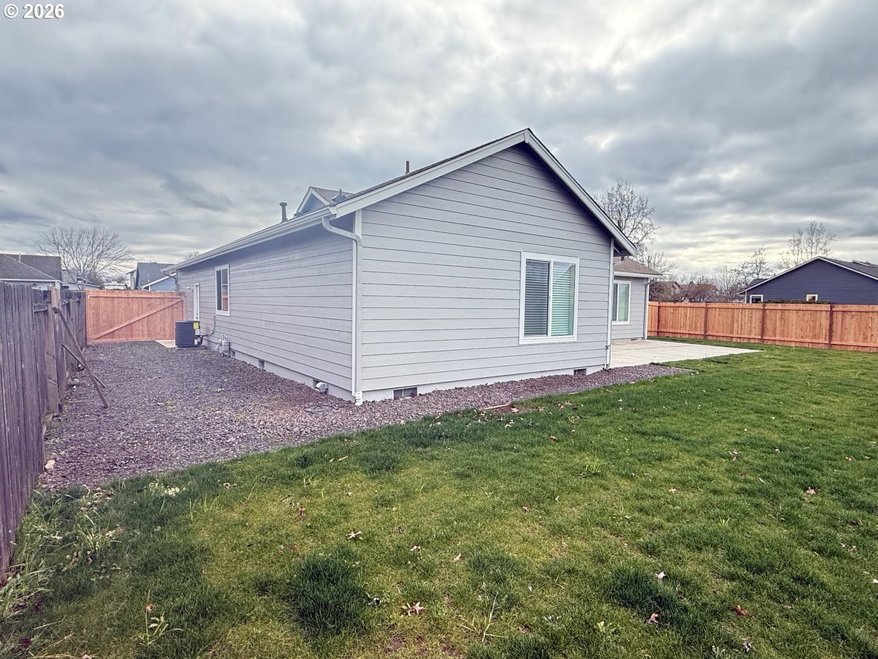 905 Monroe Street Harrisburg, OR 97446 - Photo 30 of 31 a backyard of a house with lots of green space