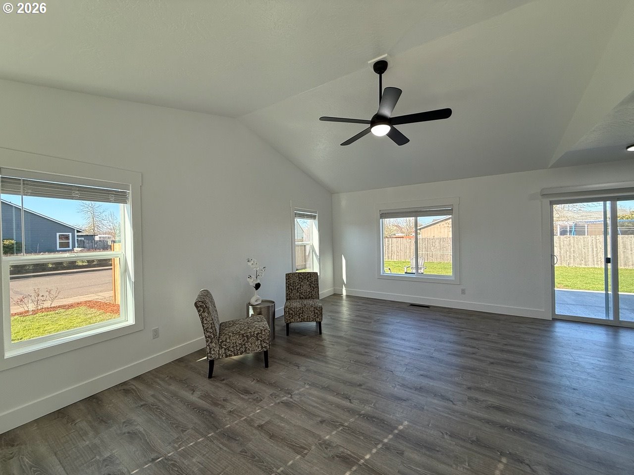 905 Monroe Street Harrisburg, OR 97446 - Photo 6 of 31 a living room with furniture and a window