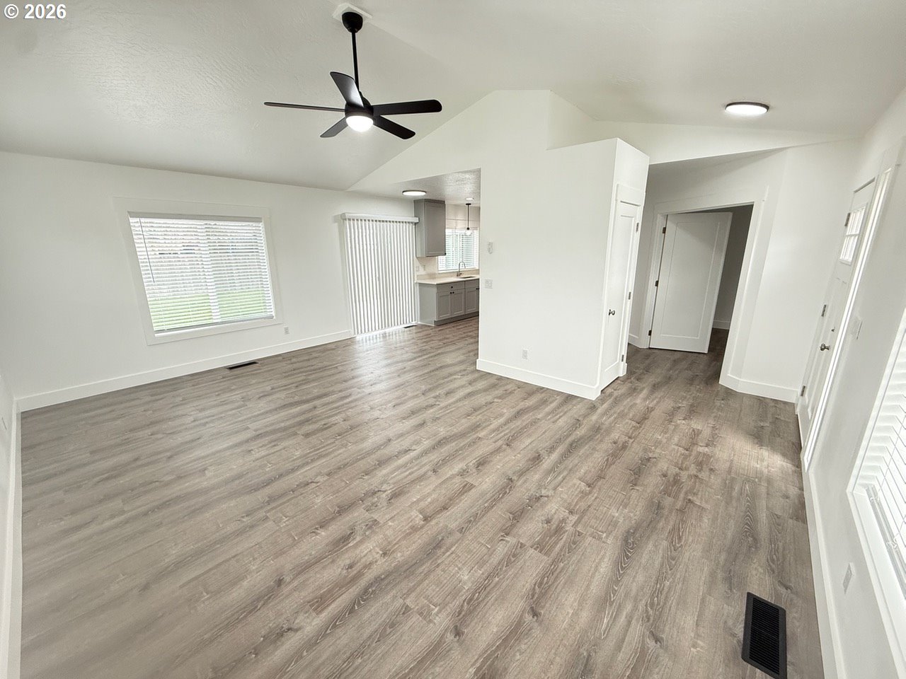 905 Monroe Street Harrisburg, OR 97446 - Photo 8 of 31 a view of empty room with wooden floor
