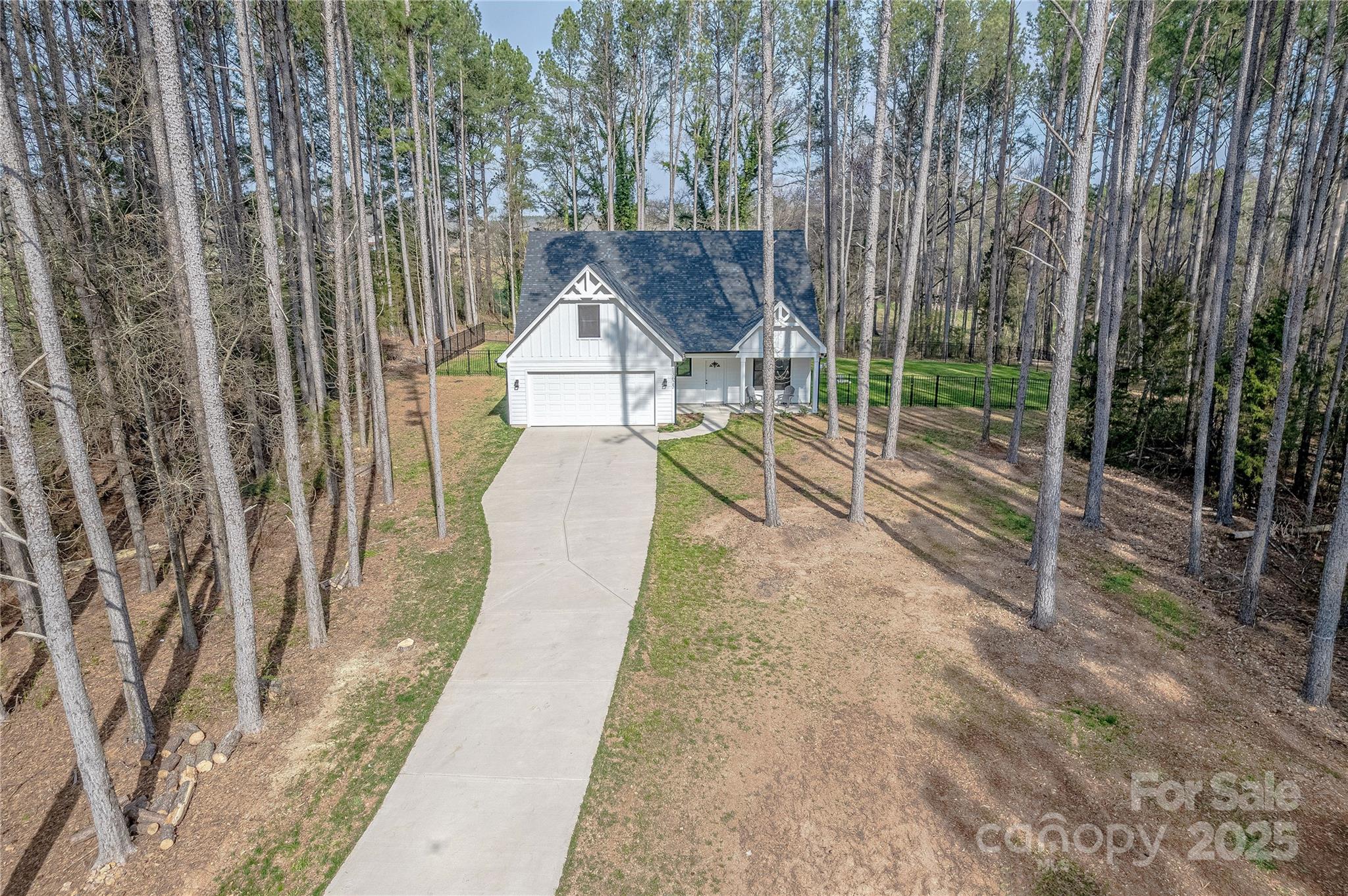 13625 Buster Road Stanfield, NC 28163 - Photo 2 of 43 a view of a house with backyard