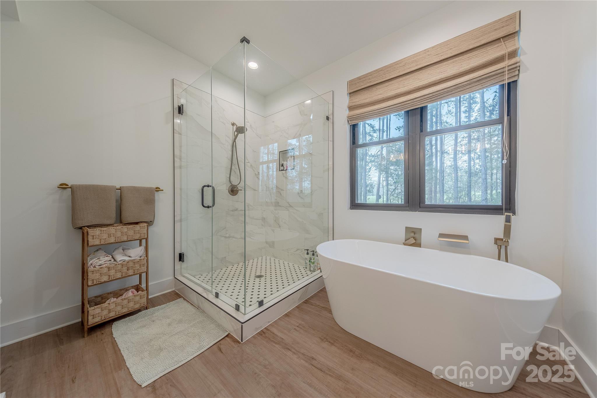 13625 Buster Road Stanfield, NC 28163 - Photo 21 of 43 a spacious bathroom with a shower and a bathtub