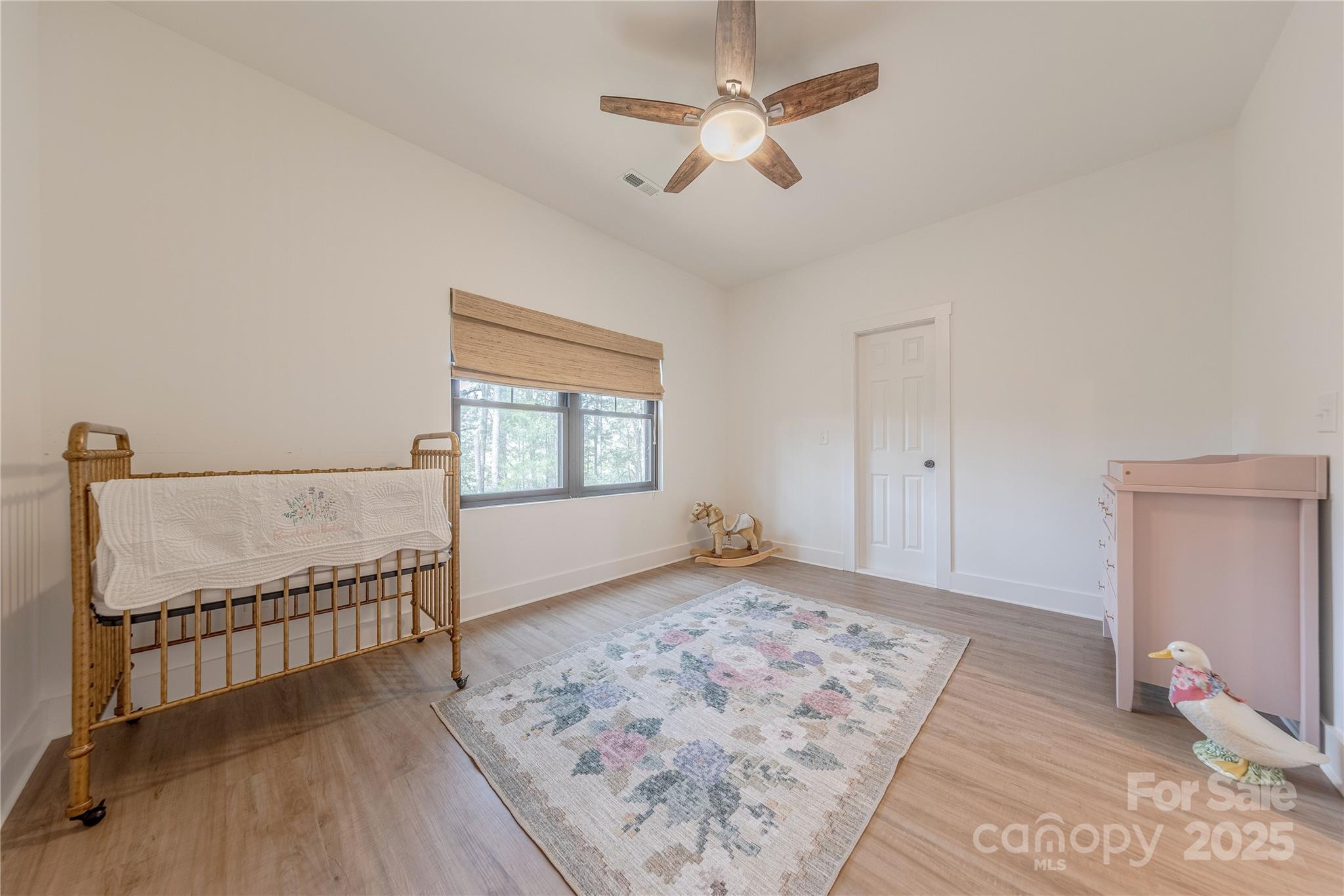 13625 Buster Road Stanfield, NC 28163 - Photo 28 of 43 a view of an empty room with a window