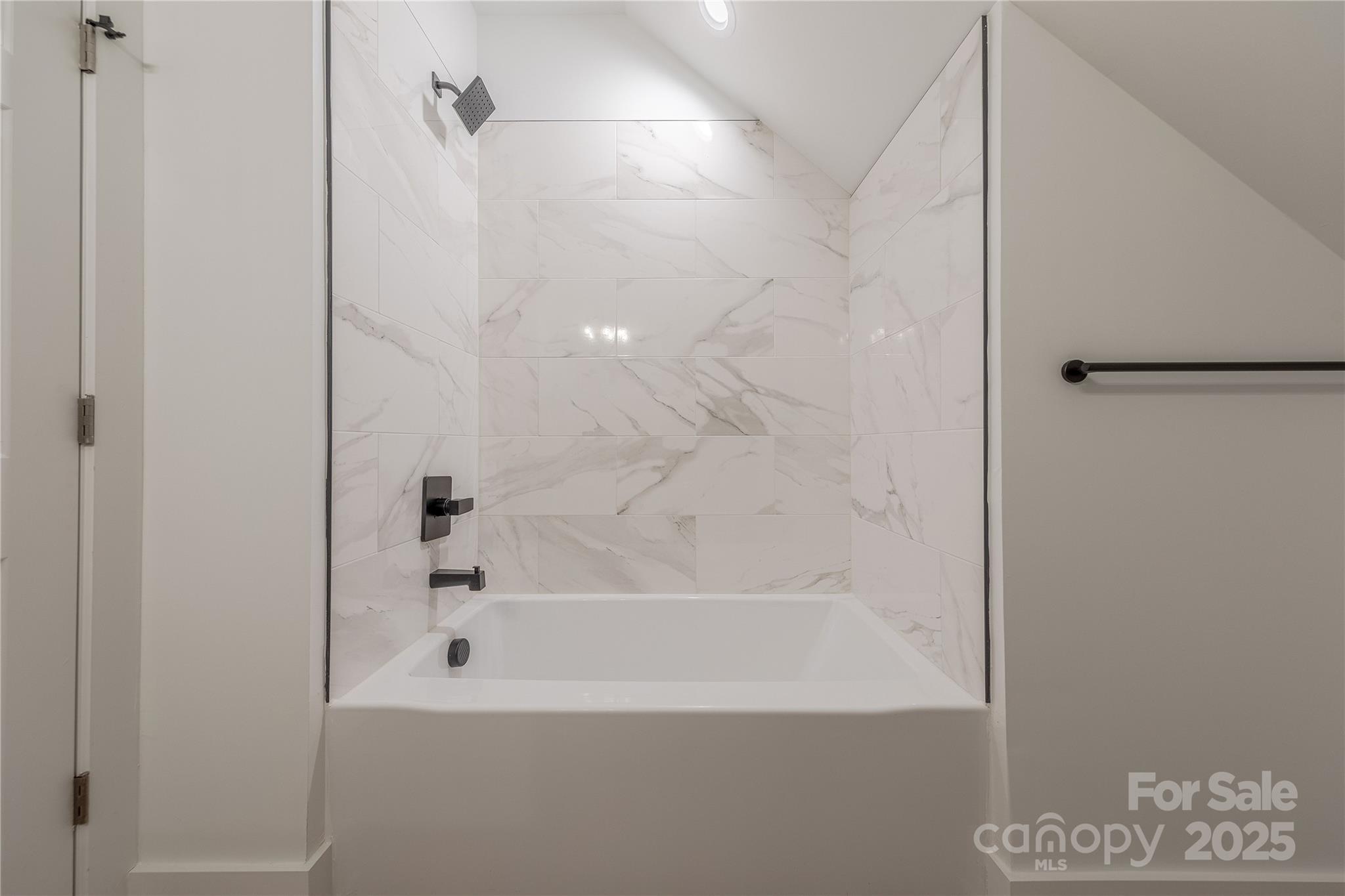 13625 Buster Road Stanfield, NC 28163 - Photo 36 of 43 a bathroom with a bathtub