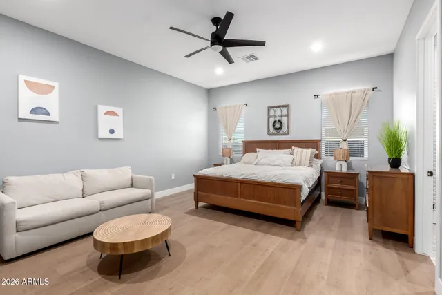 a view of swimming pool with outdoor seating