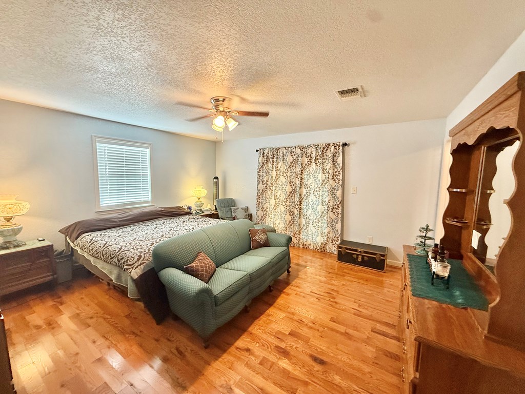 281 Oak Road Harper, TX 78631 - Photo 11 of 22 a living room with furniture and a flat screen tv