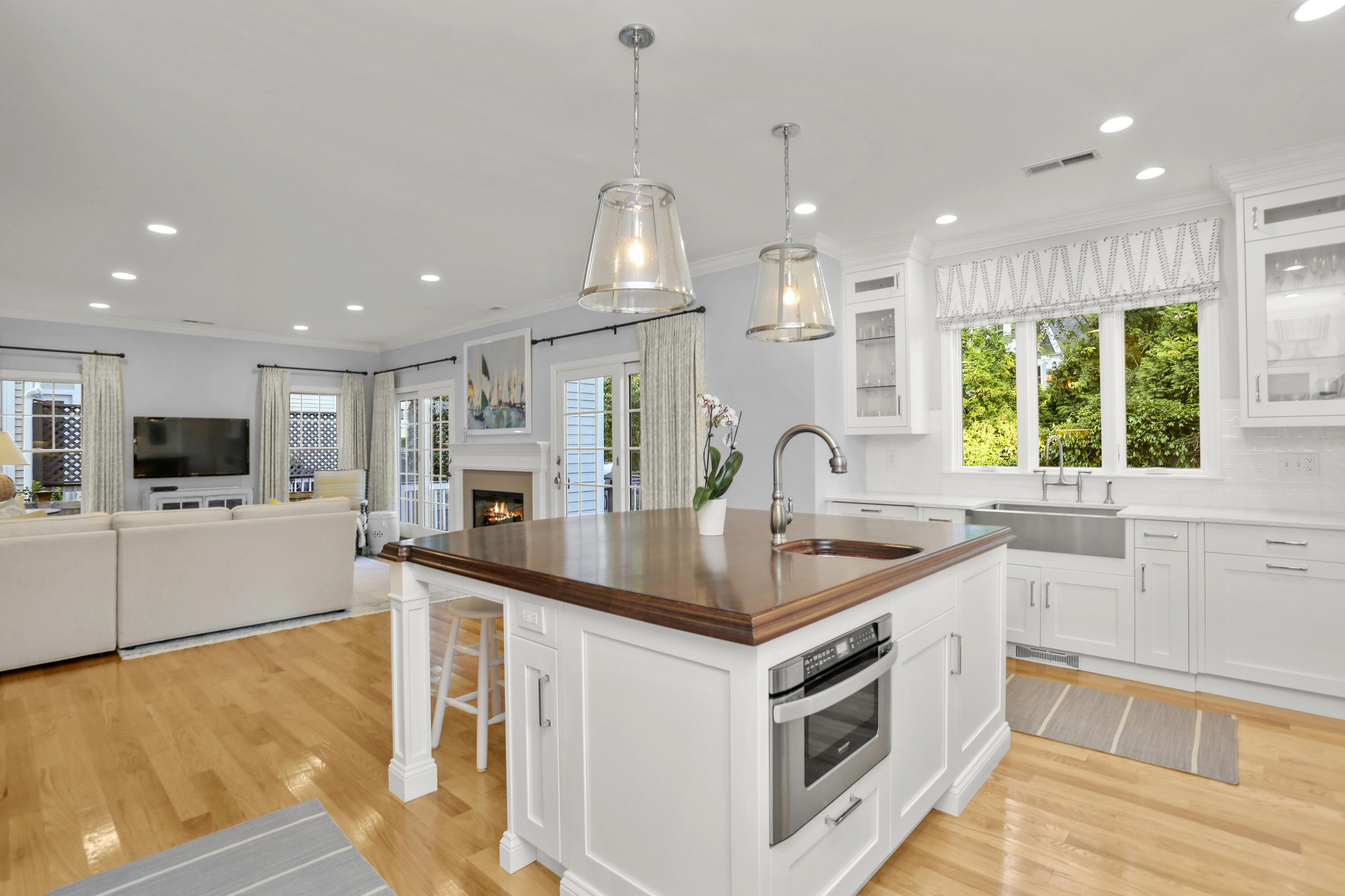 12 Richmond Road Norwalk, CT 06853 - Photo 12 of 40 a kitchen with stainless steel appliances granite countertop a sink and a stove top oven