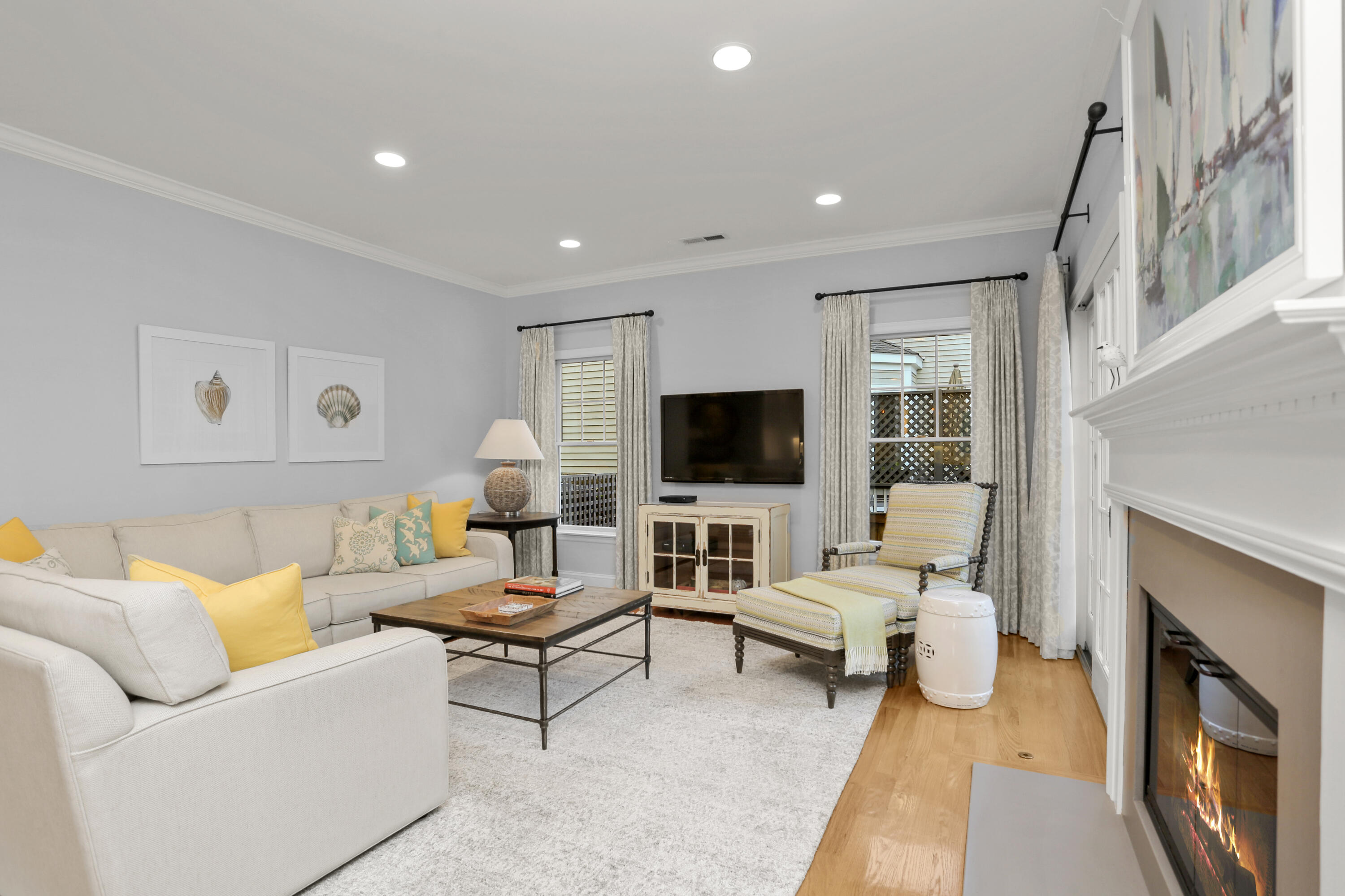 12 Richmond Road Norwalk, CT 06853 - Photo 16 of 40 a living room with furniture and a flat screen tv