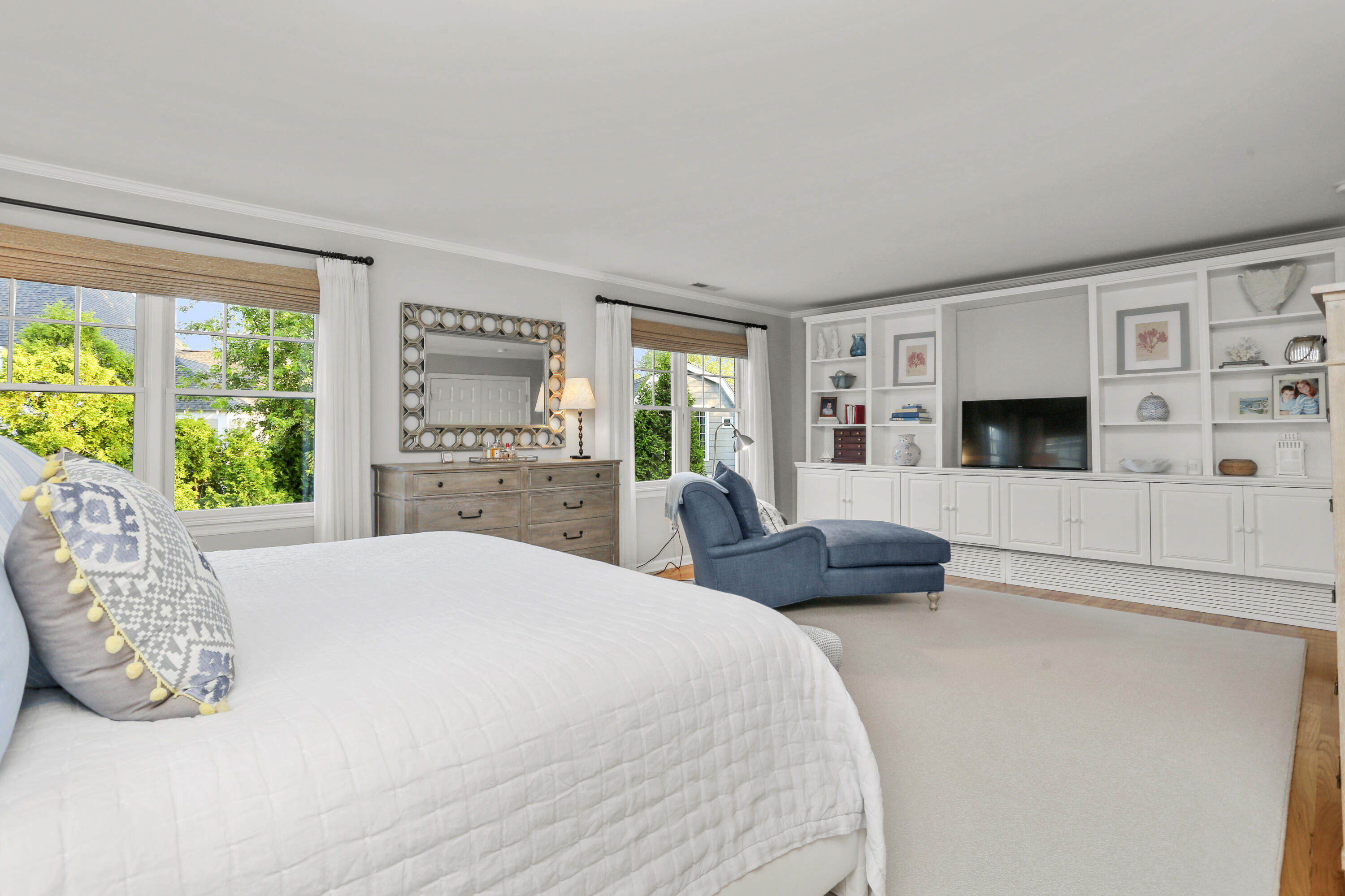 12 Richmond Road Norwalk, CT 06853 - Photo 20 of 40 a bedroom with a bed and a flat screen tv