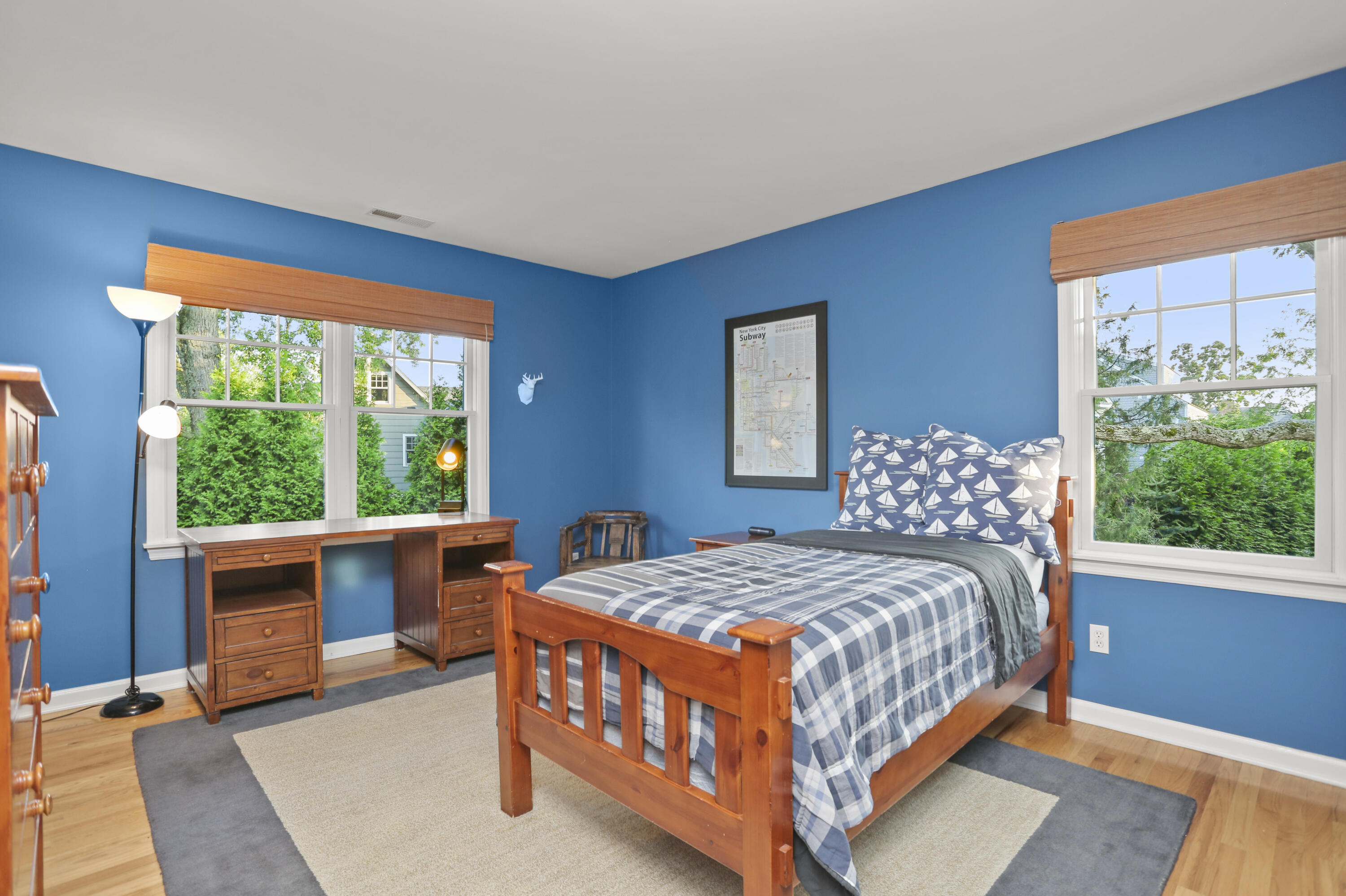 12 Richmond Road Norwalk, CT 06853 - Photo 23 of 40 a bedroom with a bed and a large window