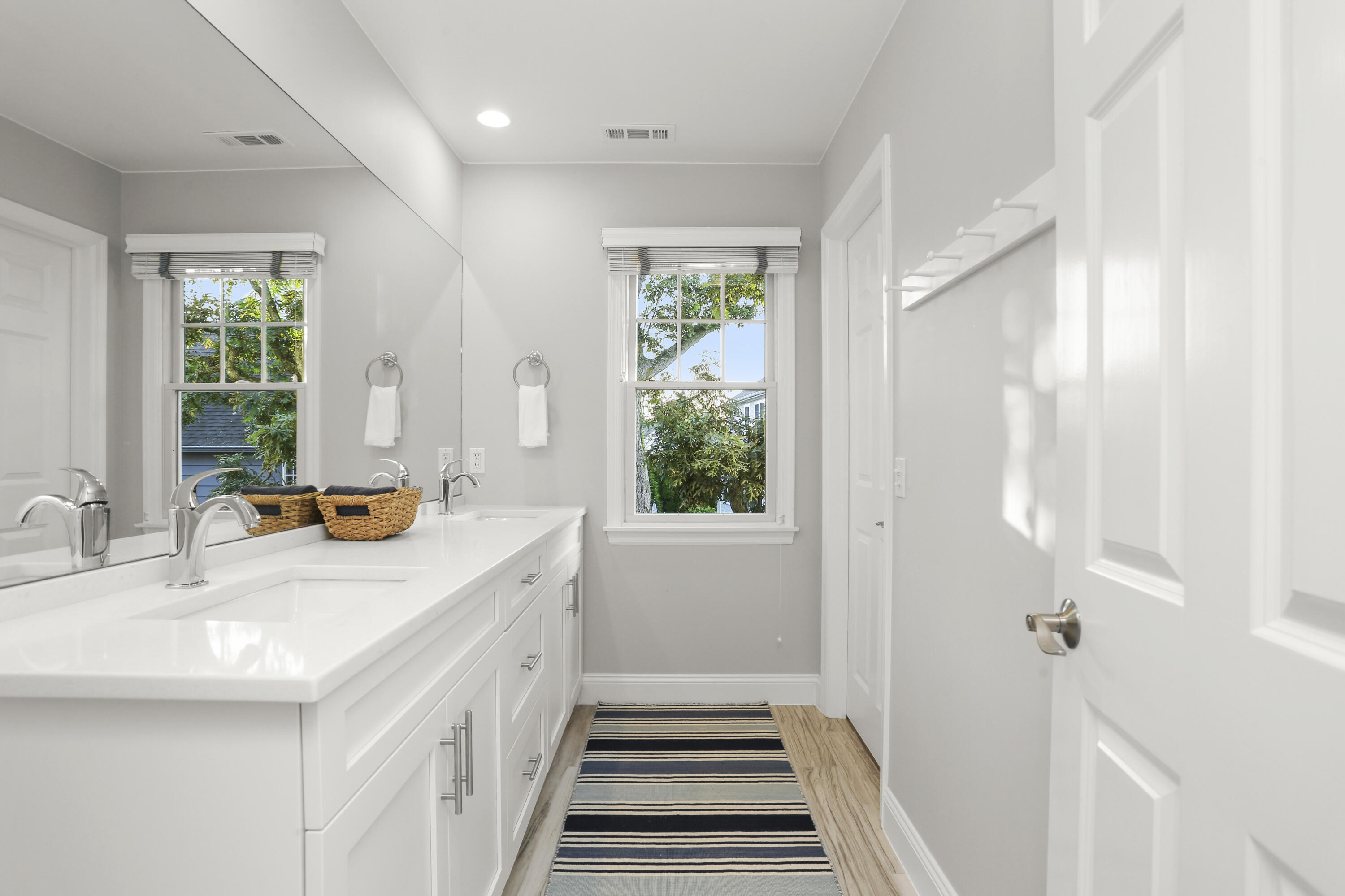 12 Richmond Road Norwalk, CT 06853 - Photo 24 of 40 a kitchen with sink cabinets and wooden floor
