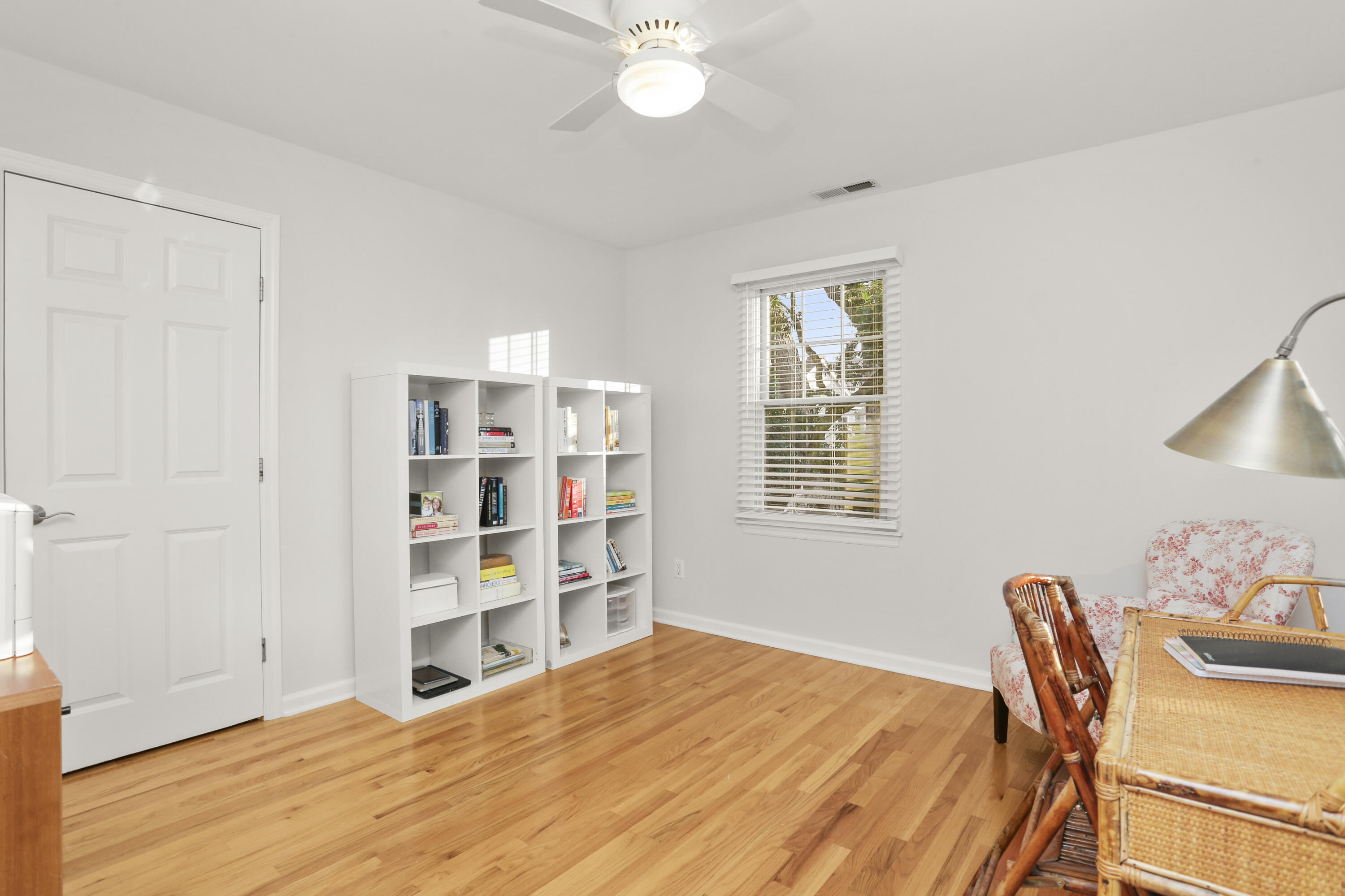 12 Richmond Road Norwalk, CT 06853 - Photo 27 of 40 a bedroom with a bed and a book shelf