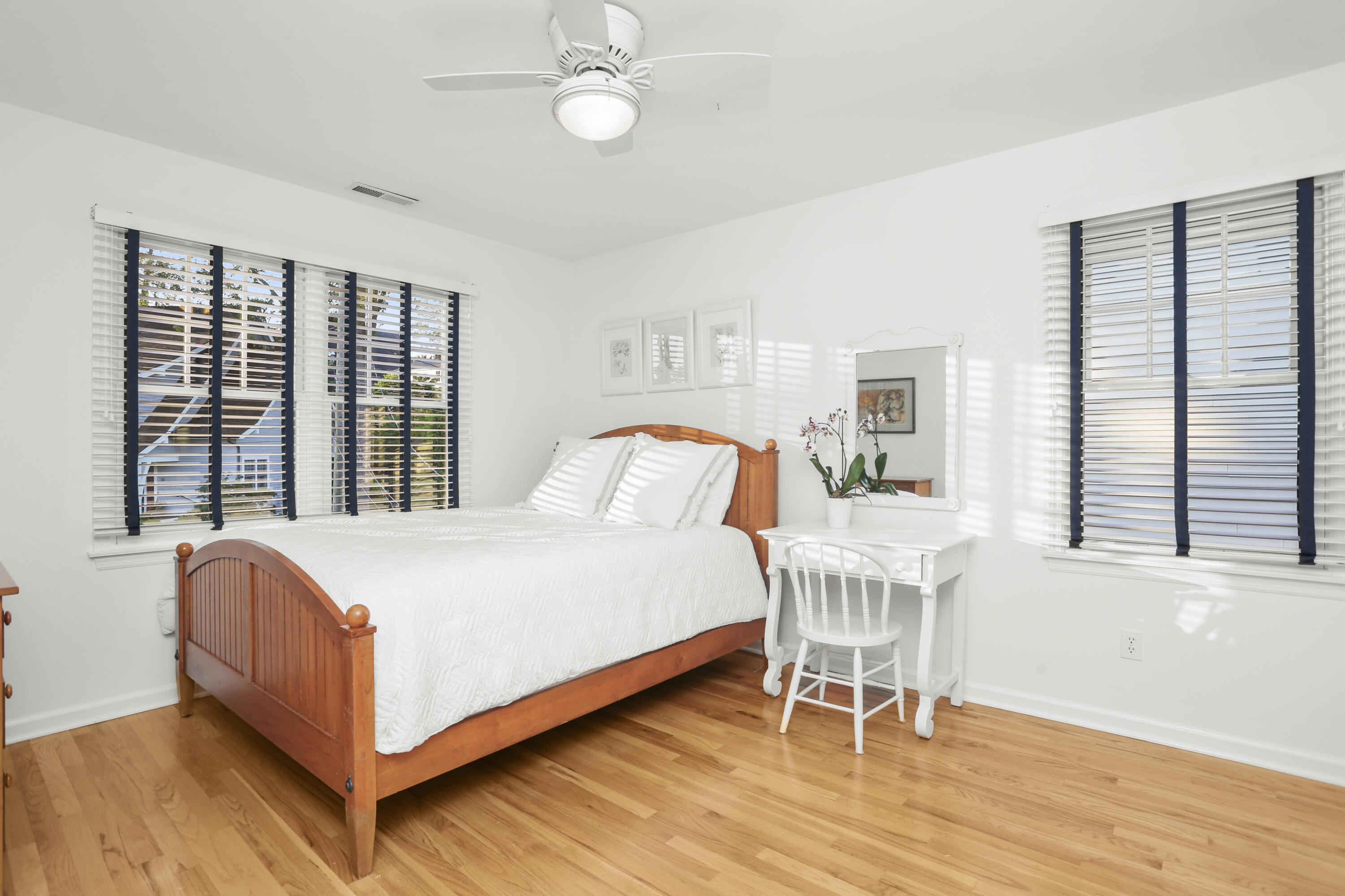 12 Richmond Road Norwalk, CT 06853 - Photo 28 of 40 a bedroom with a bed and a large window