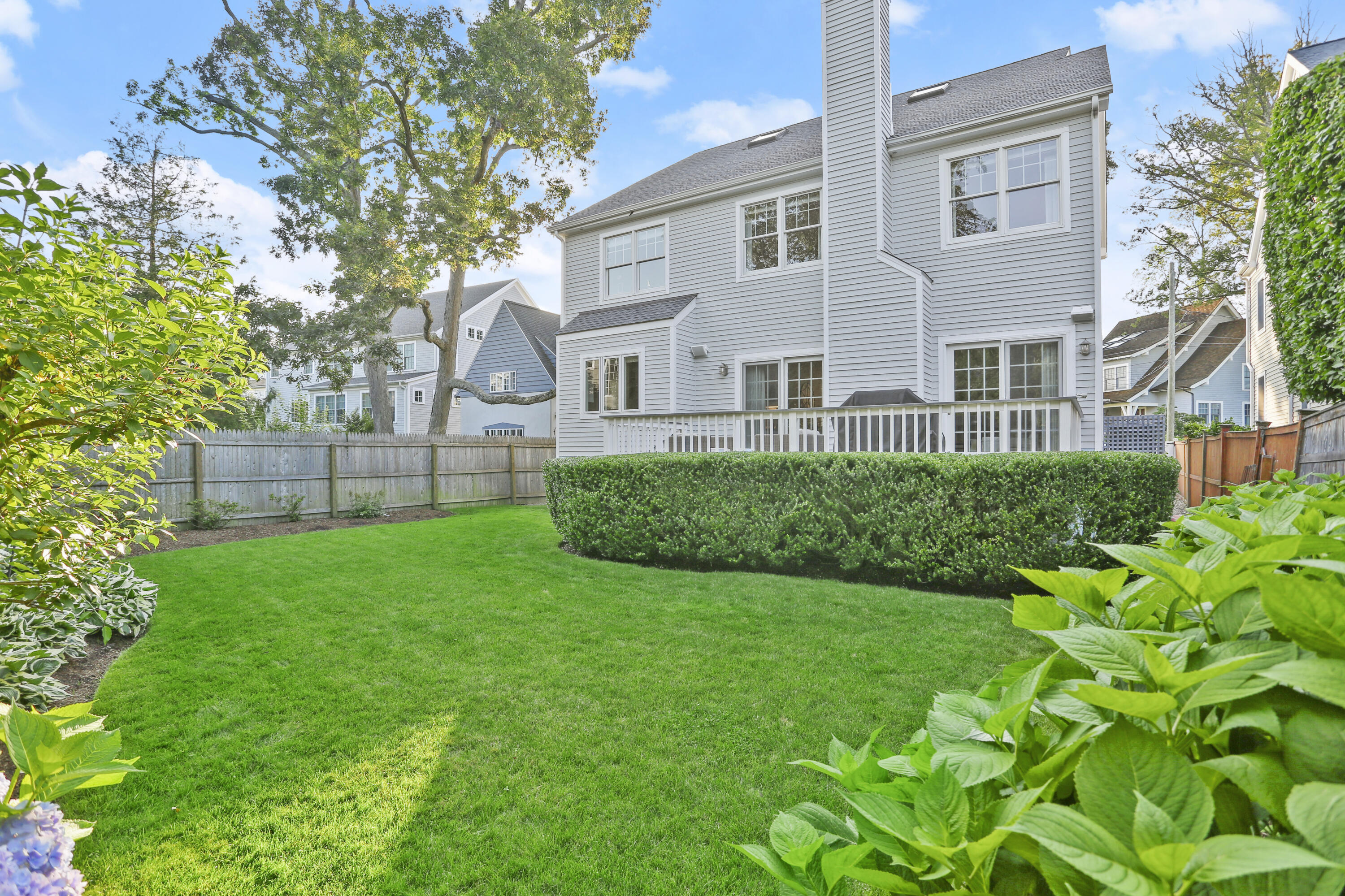 12 Richmond Road Norwalk, CT 06853 - Photo 33 of 40 a front view of a house with a yard