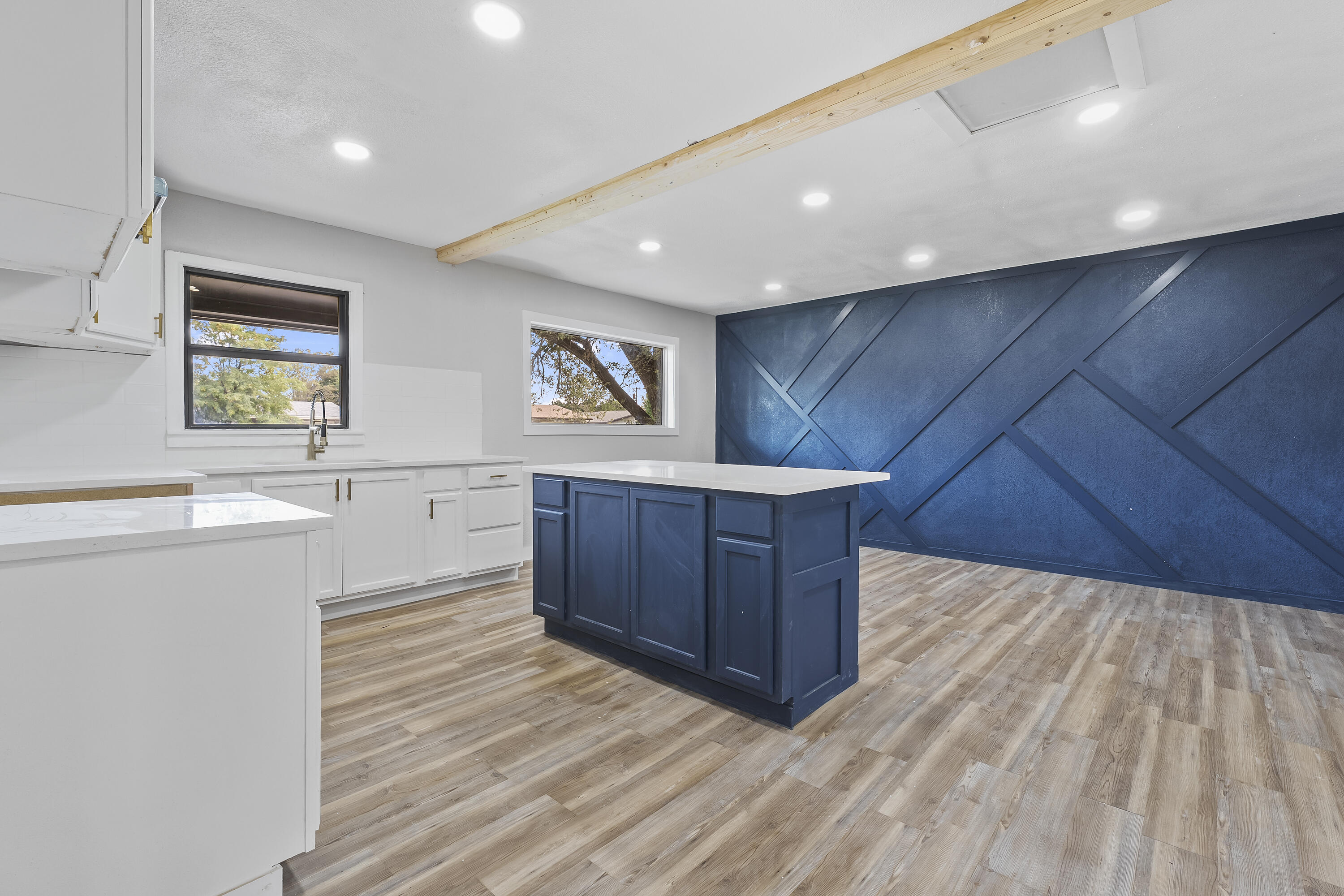 4308 43rd Street Lubbock, TX 79413 - Photo 14 of 28 a view of a kitchen with wooden floor