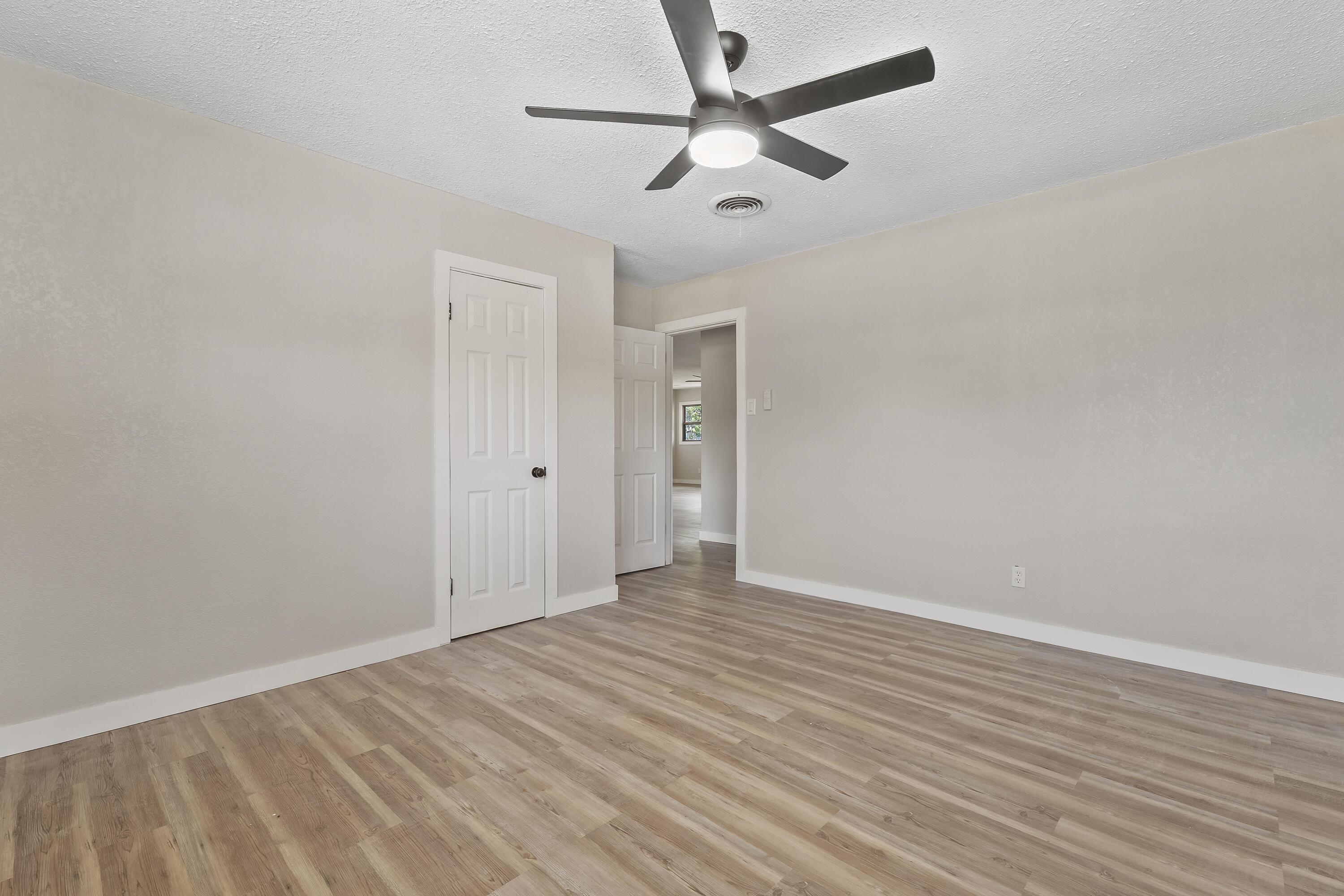 4308 43rd Street Lubbock, TX 79413 - Photo 23 of 28 wooden floor in an empty room