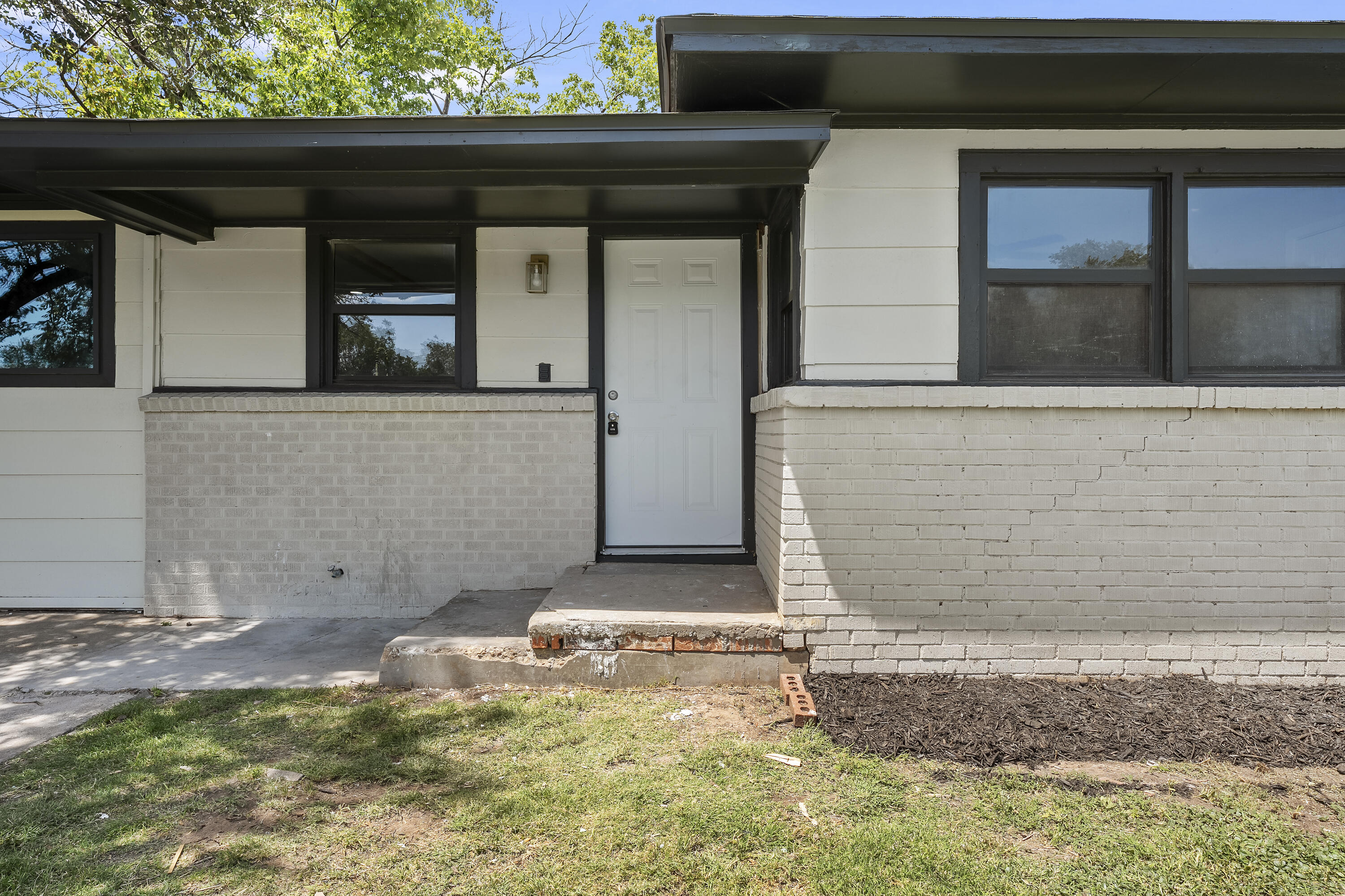 4308 43rd Street Lubbock, TX 79413 - Photo 3 of 28 a front view of a house