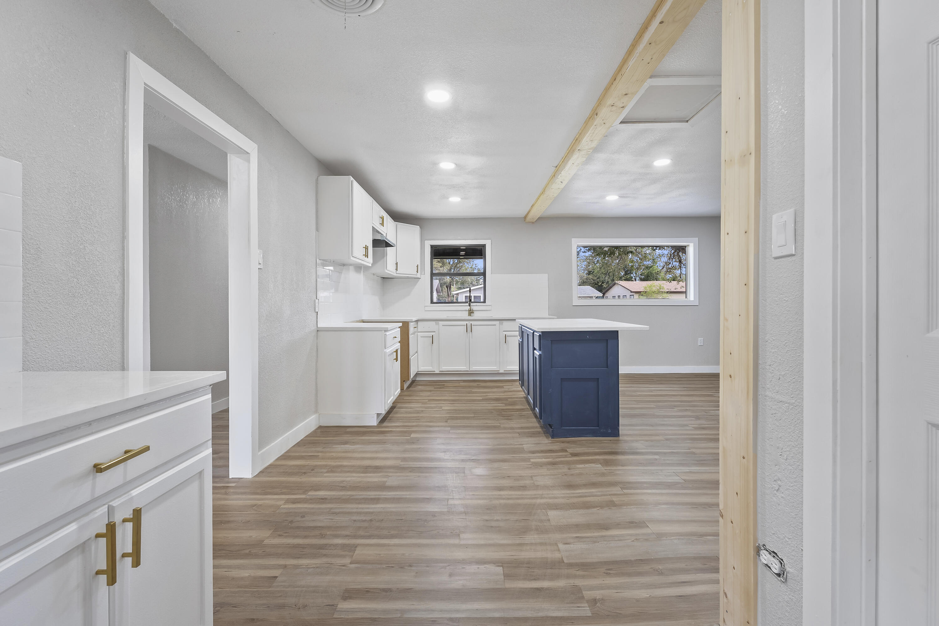 4308 43rd Street Lubbock, TX 79413 - Photo 9 of 28 a view of kitchen with wooden floor