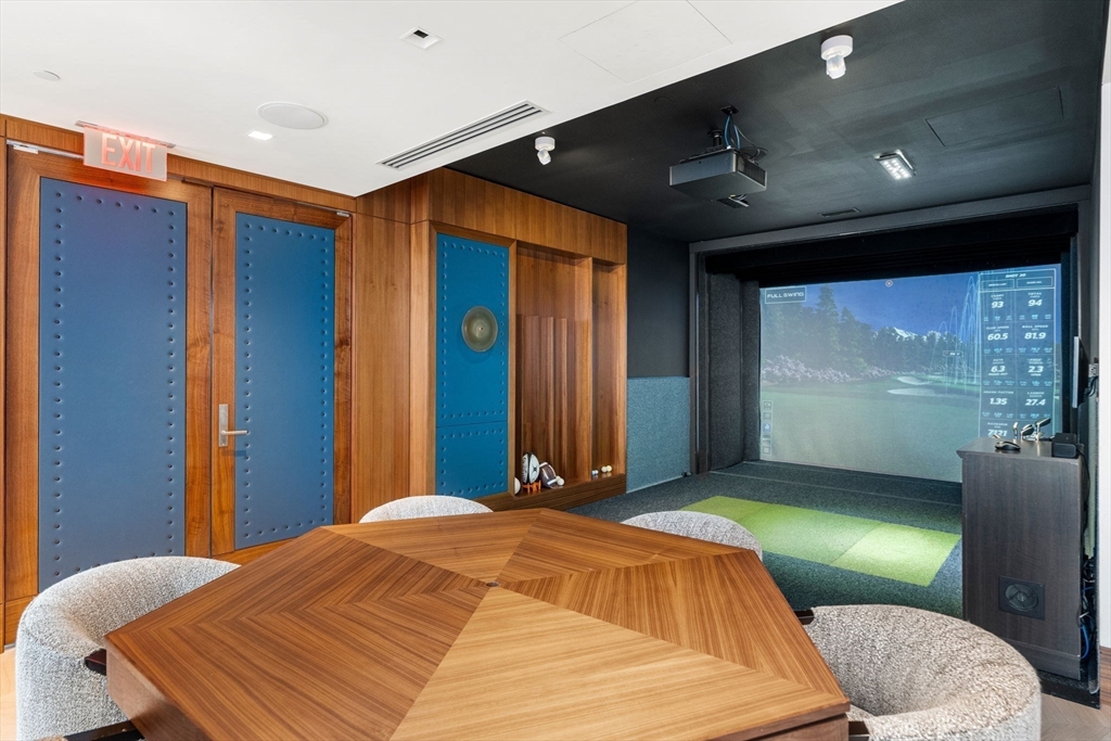 150 Seaport, Unit 9C Boston, MA 02210 - Photo 25 of 39 a bedroom with a large bed and a large window